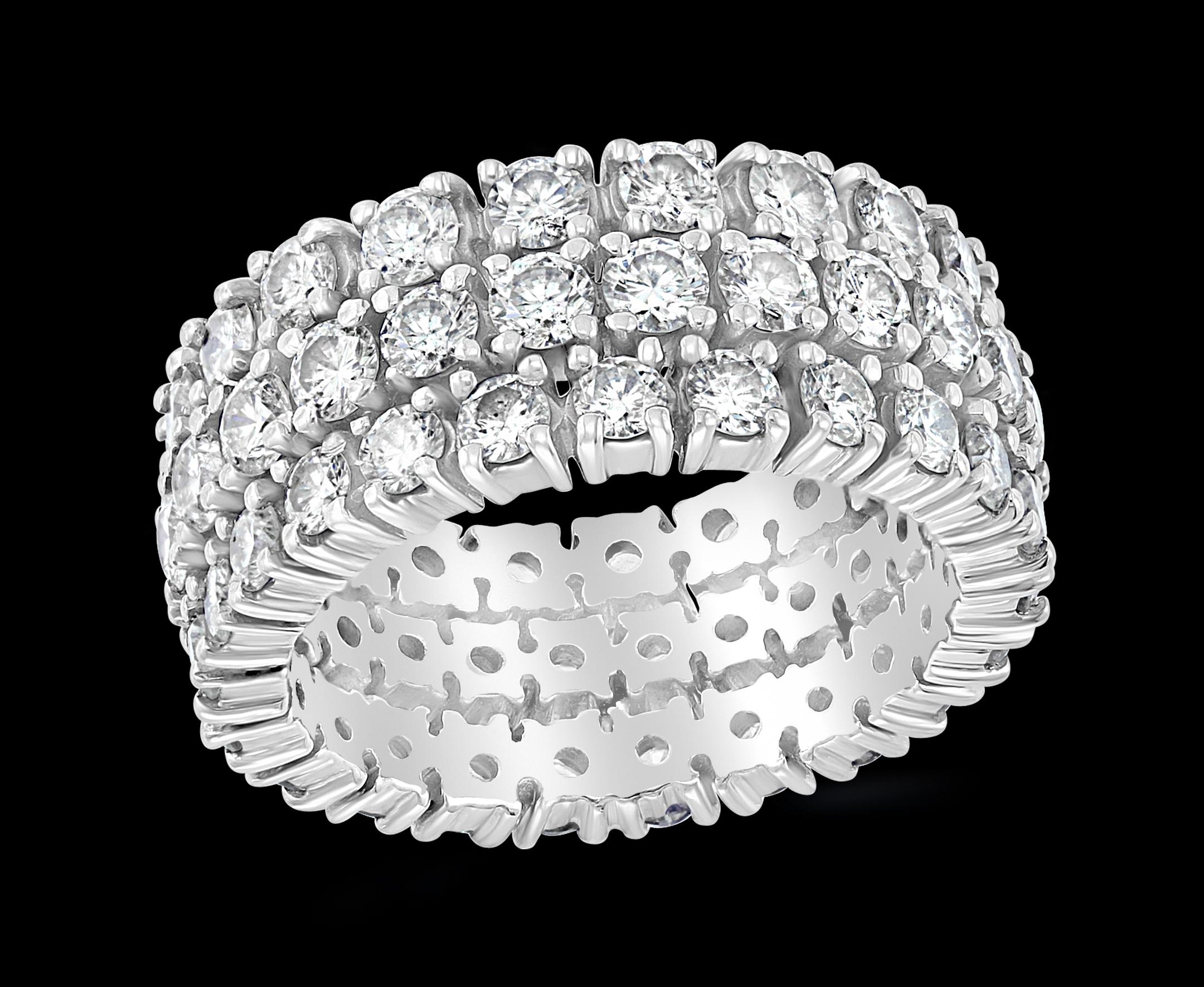 Approximately 4 Carat Diamond Eternity Engagement Band 14 Karat White Gold 3 Row Band Size 6& 1/4
Diamond quality and  color is very nice , all eye clean diamonds with lots of shine and brilliance and sparkle
This eternity band features Three rows