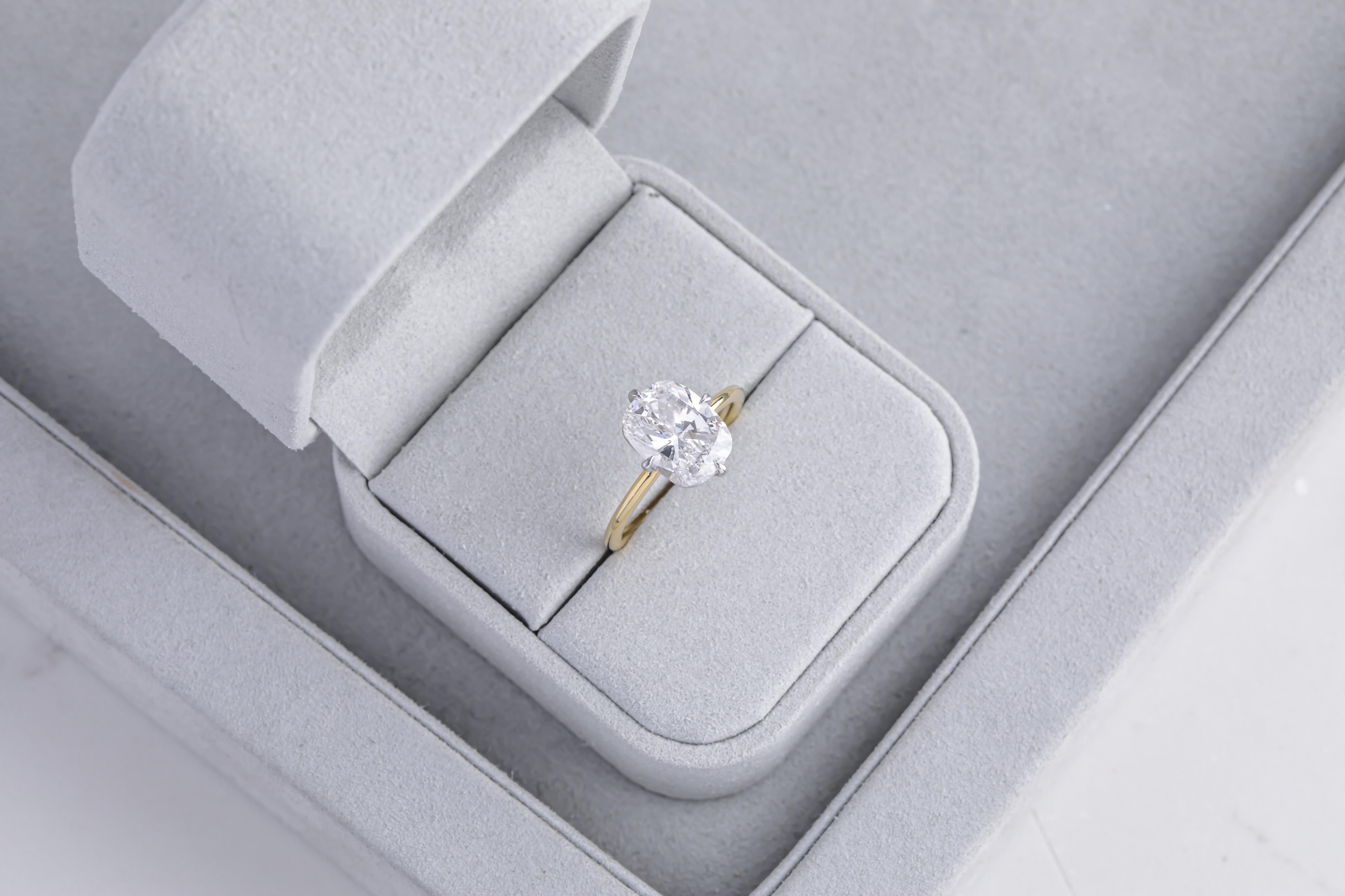 four carat cushion cut diamond ring
