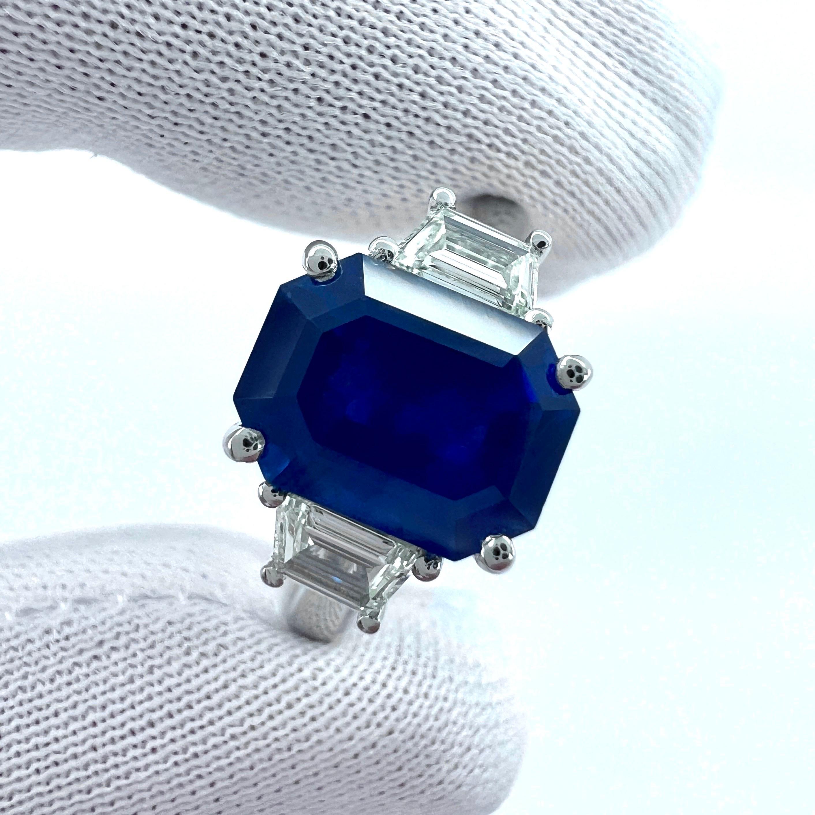 Fine Natural 'Velvet' Blue Emerald Cut Ceylon Sapphire & Diamond Three Stone Platinum Ring.

Large 3.5 Carat blue Ceylon sapphire with an excellent emerald octagon cut and very good clarity. Some small natural features in the stone under a loupe,