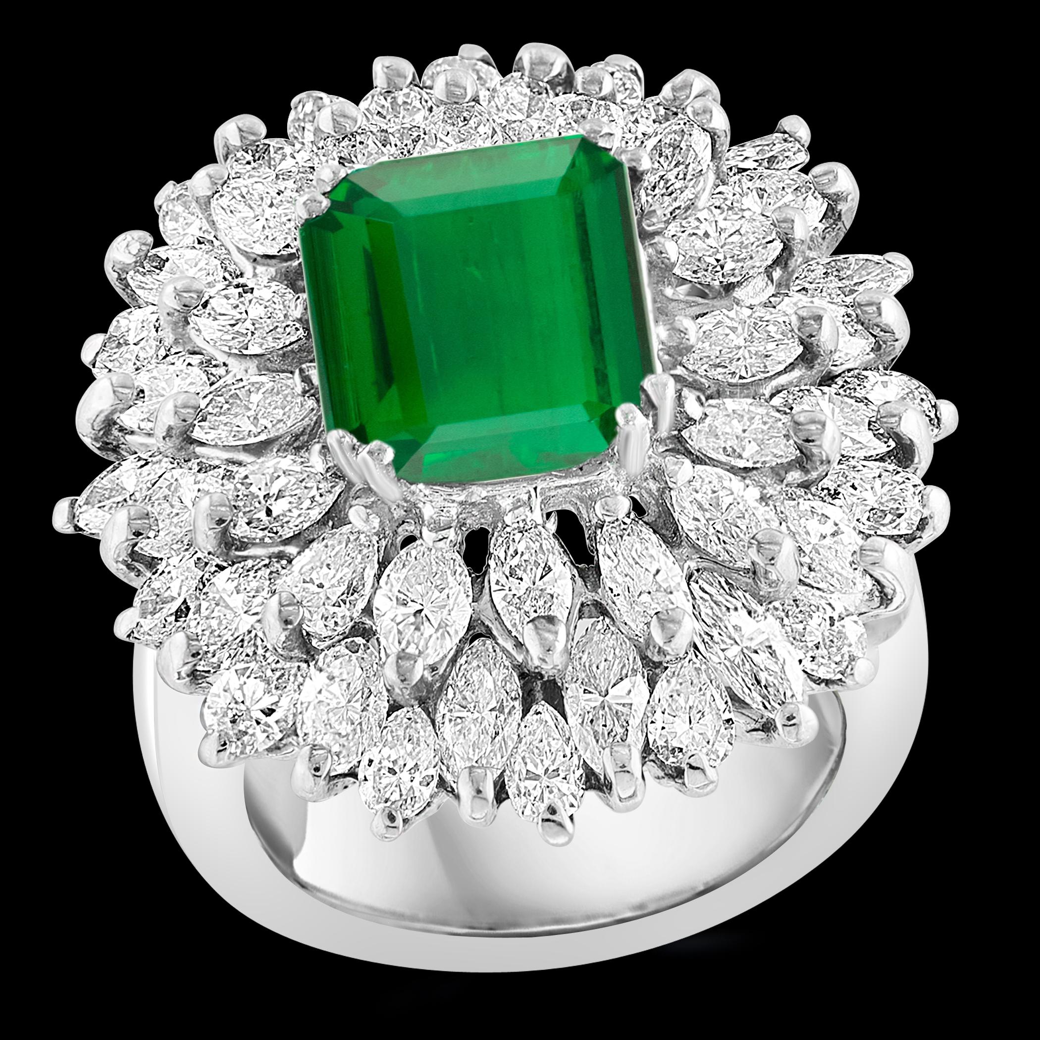 **4 Carat Emerald Cut Colombian Emerald & 5.5 Ct Diamond Ring in Platinum Size 6**

A classic ring featuring a stunning 4 Carat Colombian Emerald of exceptional quality, color, and luster. The emerald, originating from Colombia, is a rare find due