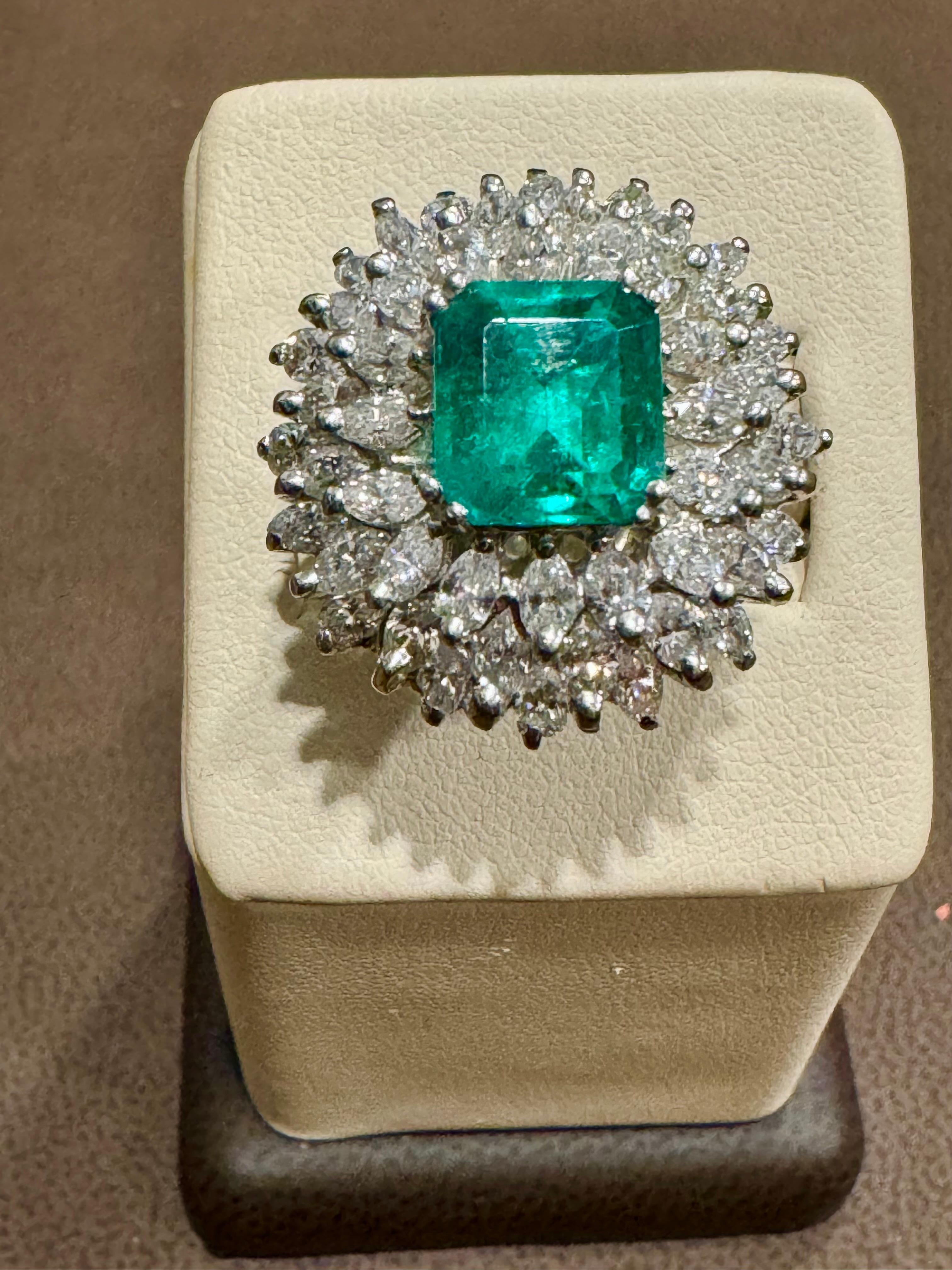 4 Carat Emerald Cut Colombian Emerald & 5.5 Ct Diamond Ring in Platinum Size 6 In Excellent Condition For Sale In New York, NY