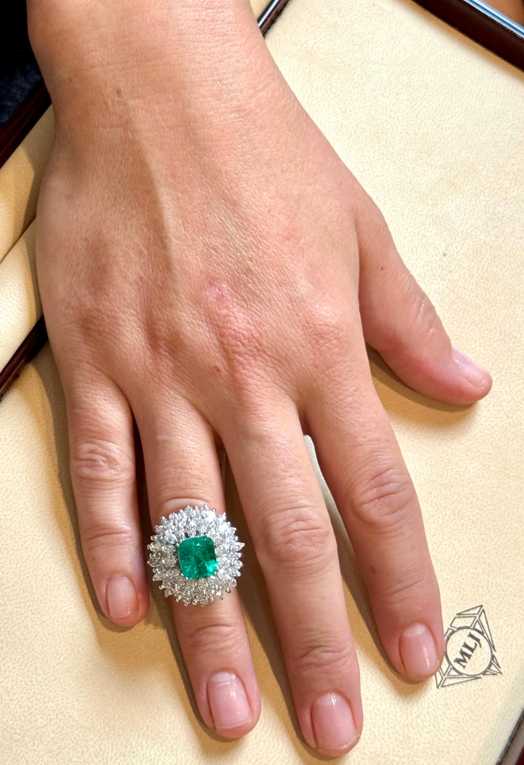 4 Carat Emerald Cut Colombian Emerald & 5.5 Ct Diamond Ring in Platinum Size 6 In Excellent Condition For Sale In New York, NY