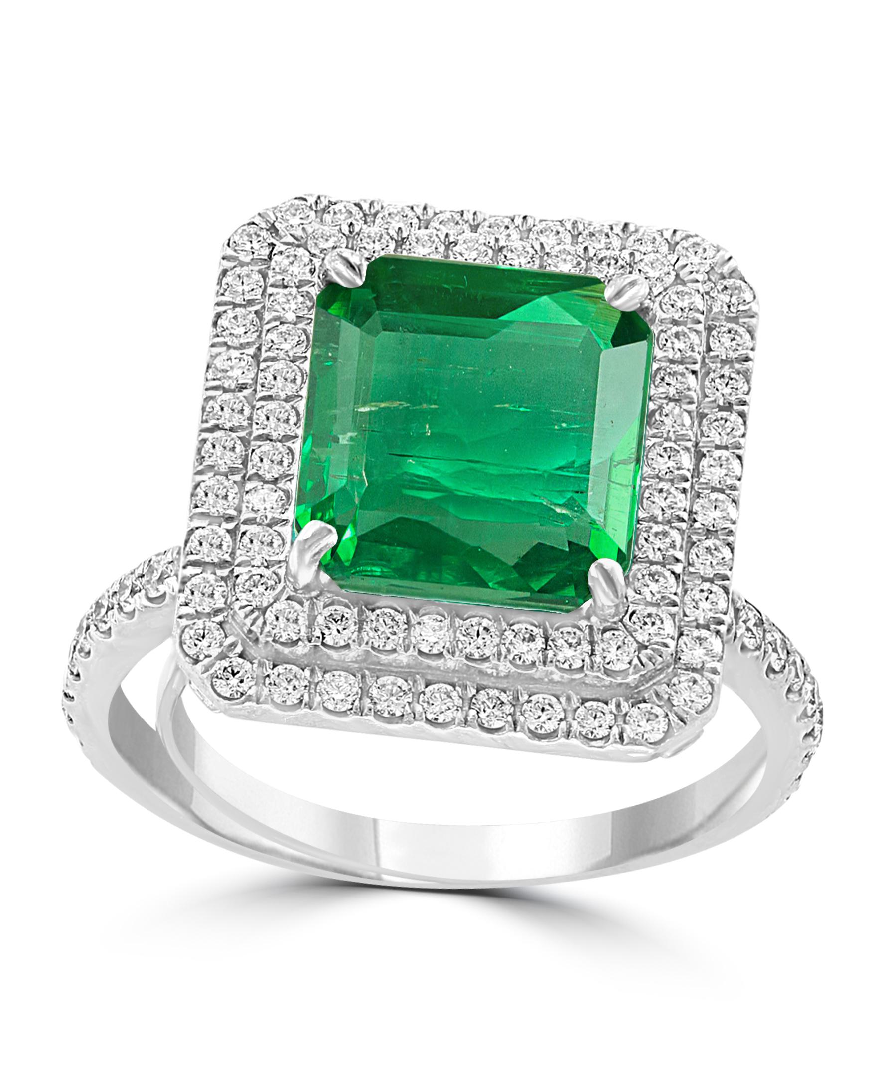 A classic, Cocktail ring 
4.0 Carat  Colombian Emerald and Diamond Ring,  with no color enhancement.
Platinum 10 gm
 Diamonds: approximate 2.3 Carat 
Emerald: 4 Carat 
Origin : Colombia 
Color: Deep  Green, Transparent extreme Fine Color Quality
One