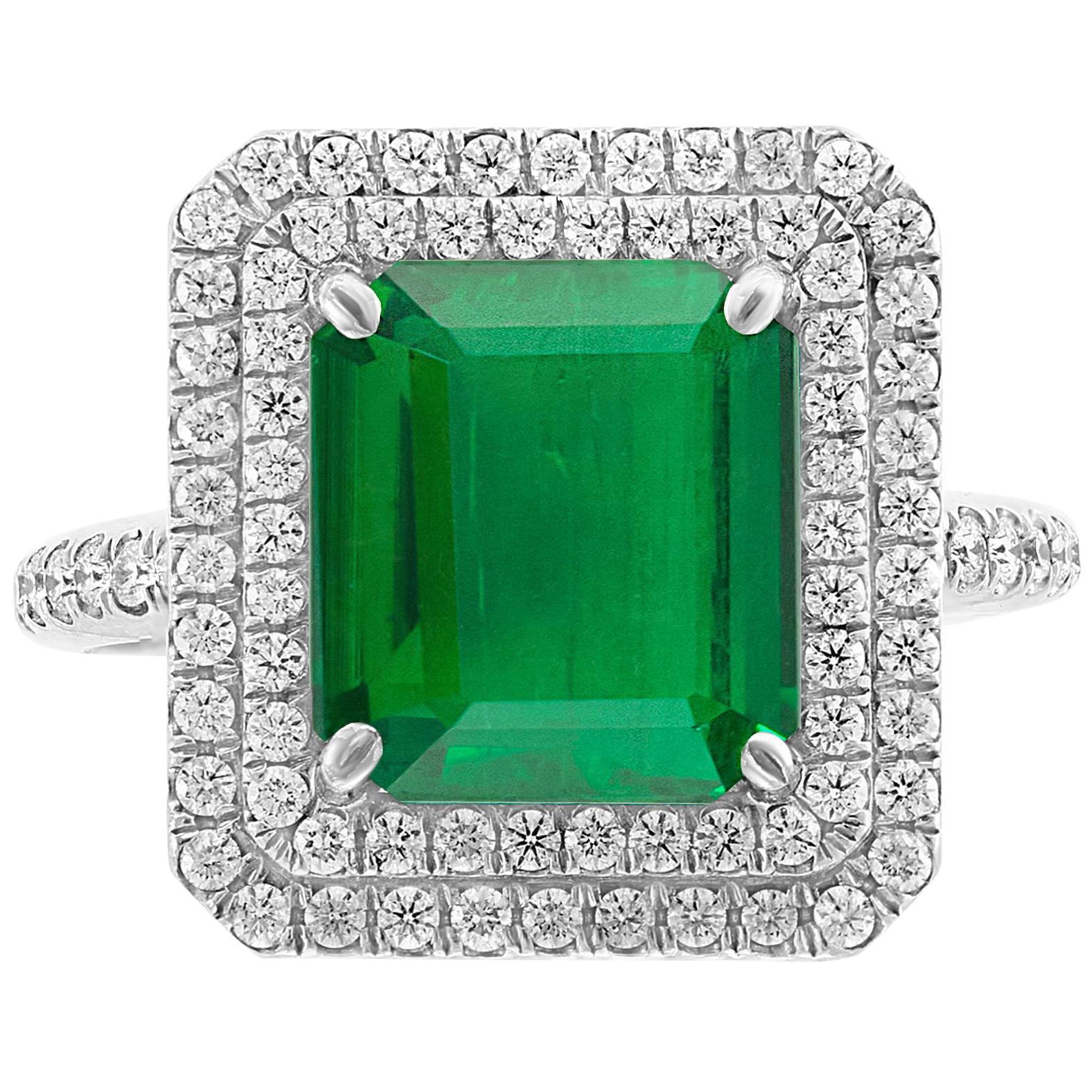 4 Carat Emerald Cut Colombian Emerald and Diamond Platinum Ring Estate For Sale