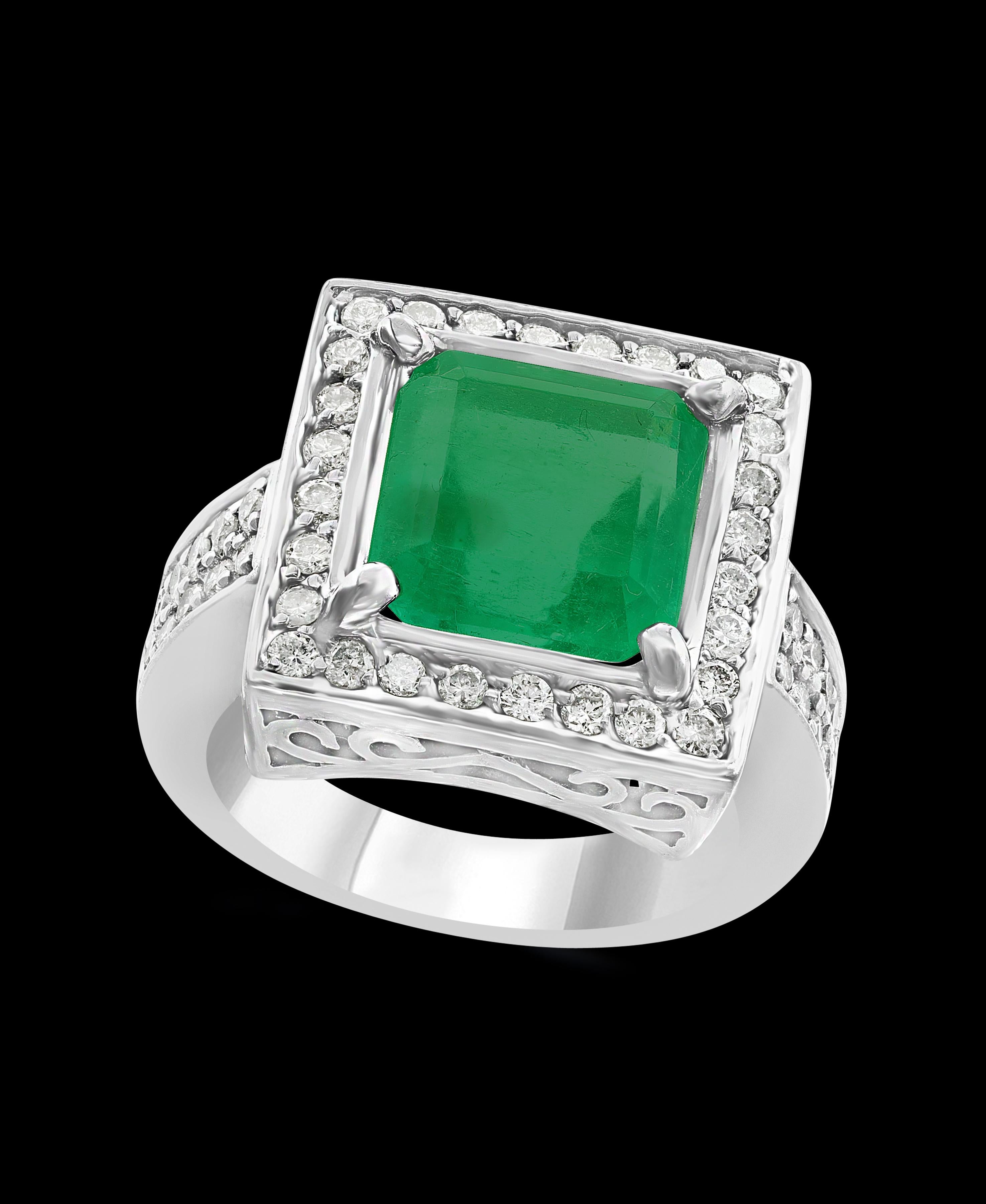 A classic, Cocktail ring 
4 Carat  Colombian Emerald and Diamond Ring, Estate, no color enhancement.
Gold: 14 carat white gold Weight: 12 gm
 Diamonds: approximate 1.85 Carat 
Emerald: 4.0 Carat 
Origin : Colombia 
Color: Deep  Green, Transparent