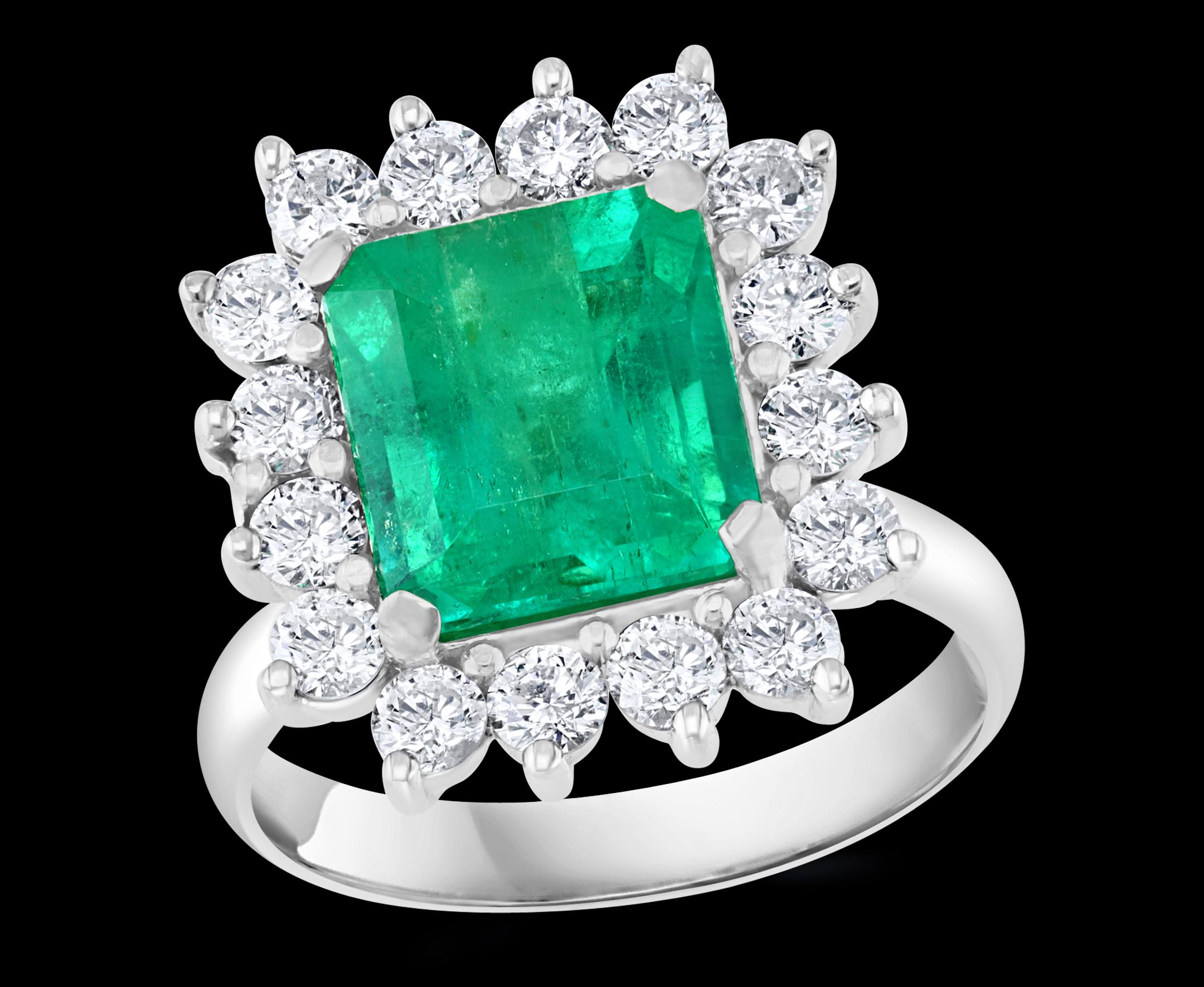 
Approximately 4  Carat Emerald Cut Colombian Emerald & Diamond Ring 14 Karat White Gold 
A Classic, ring 
 Absolutely gorgeous emerald , Very desirable color ,  fine quality ,color and luster. 
It has inclusions as all natural emeralds do.