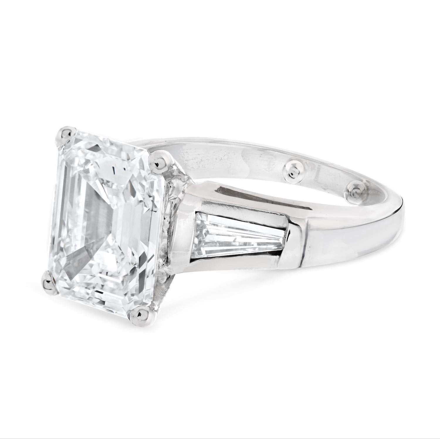 4 carat emerald cut diamond ring with baguettes