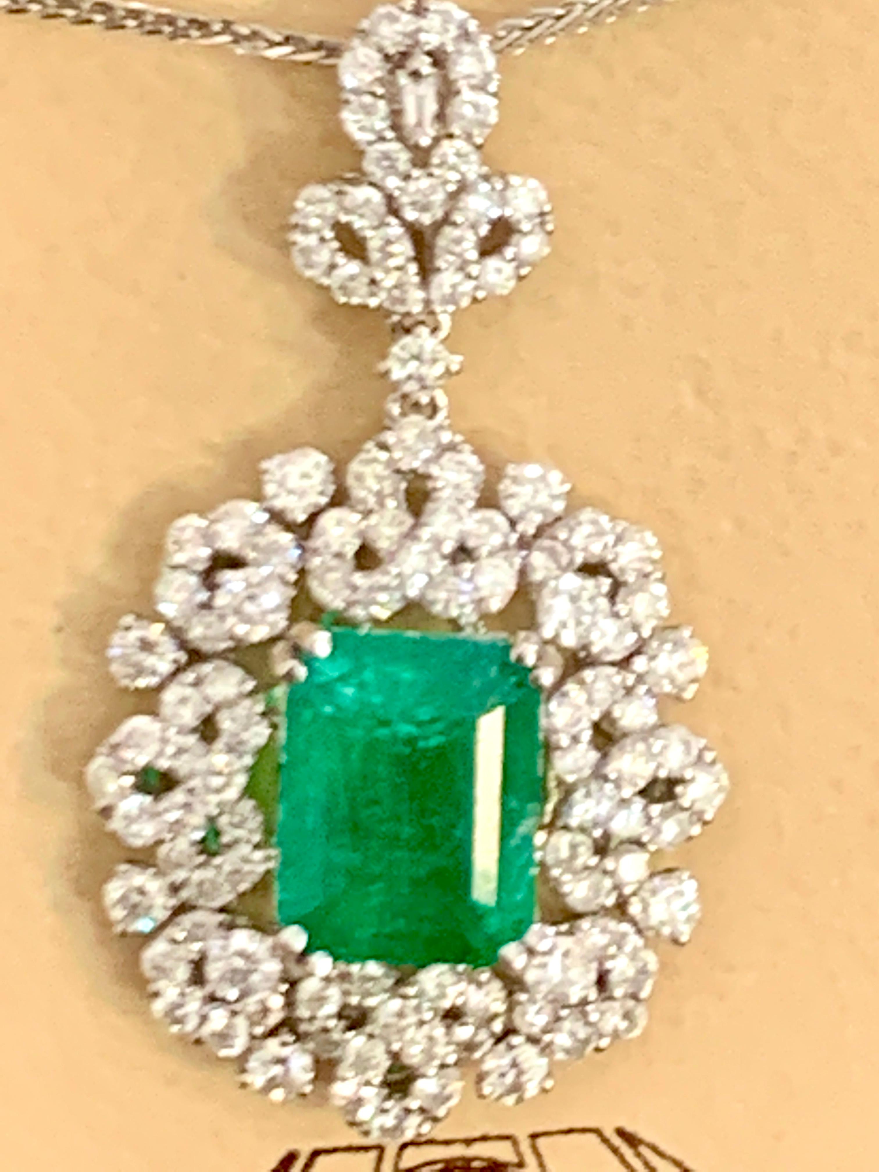 4 Carat Emerald Cut Emerald and Diamond Pendant Necklace 18 Karat Gold In Excellent Condition In New York, NY