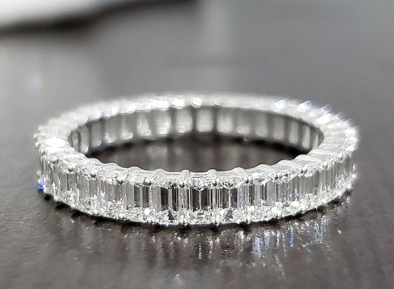 For Sale:  4 Carat Emerald Cut Eternity Band Gallery Style F-G Color VS1 Clarity Platinum 8