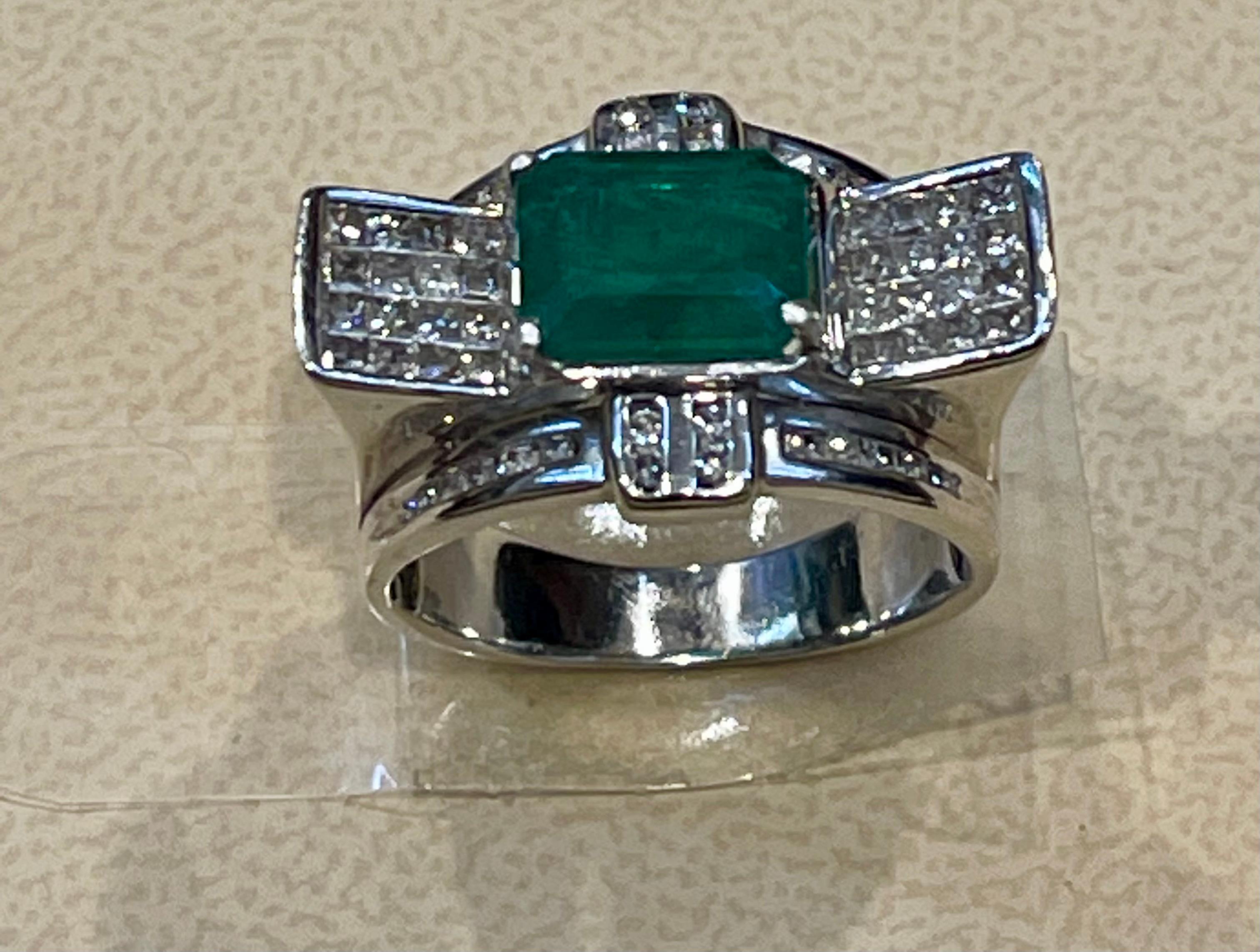 A classic, Cocktail ring 
Approximately 4 Carat  Emerald and Diamond Ring, Estate
Gold: 14 Karat  white gold 
Weight: 11.68 gm
 Diamonds: approximate 1.0 Carat 
14K stamped
Measurements of the Emerald is 8X10 which comes out to Estimated Weight 4