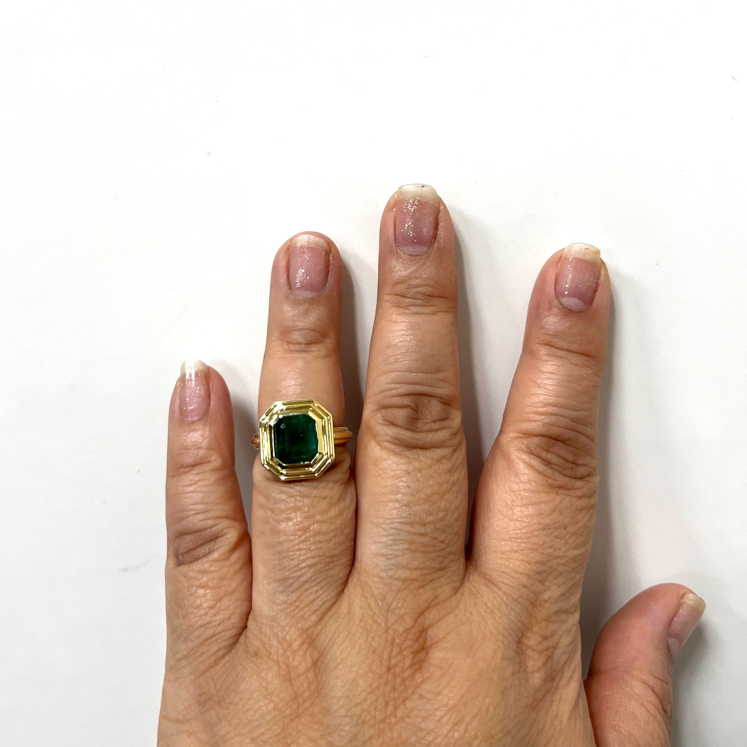 Beautiful 4.15 ct. emerald emerald cut.  Handmade in 18k yellow gold.  Ring size 6.5.