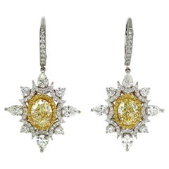 Orecchini a goccia con diamante giallo chiaro da 4 carati, certificato GIA, in oro 18k.