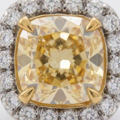 4 Carat Fancy Yellow Cushion Cut Diamond Halo Stud Earrings