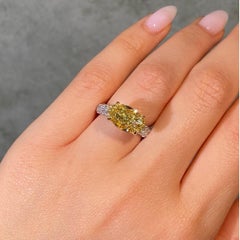 4 Carat Fancy Yellow Oval Diamond East West Pavé Engagement Ring