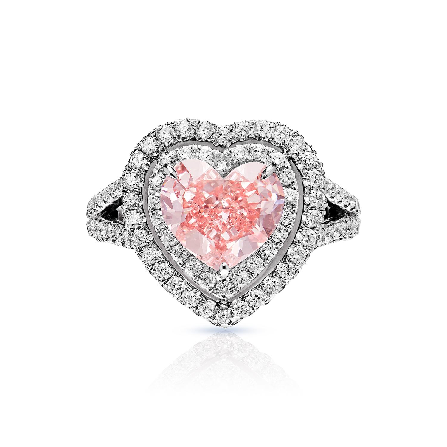 This heart-shaped ring is a gorgeous piece of jewelry that features high-quality 18-karat white gold and a stunning 2.42-carat diamond in the shape of a heart. This beautiful diamond is set in a simple yet elegant setting and has been graded as SI1,