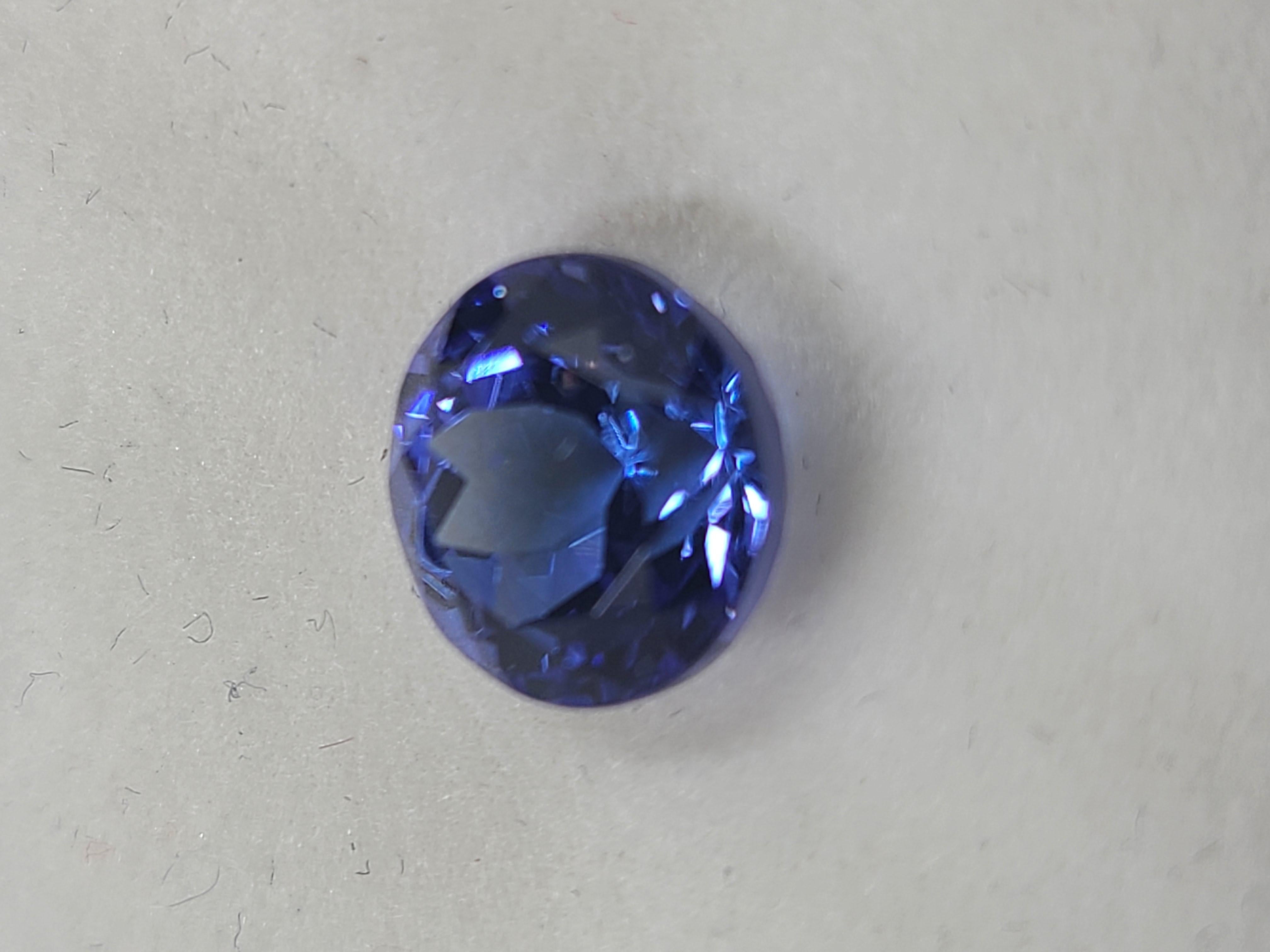 Add this stunning round faceted cut tanzanite to your gemstone and jewelry collection, or make it the main focal point for your next jewelry design. 

This single loose stone measures 9mm round with 6.90mm depth, exhibiting intense bluish-violet