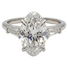 4 Carat Moval Cut Diamond Three-Stone Platinum Engagement Ring