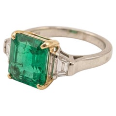 4 Carat Muzo Colombian Emerald Trapezoid Diamond Three-Stone Ring