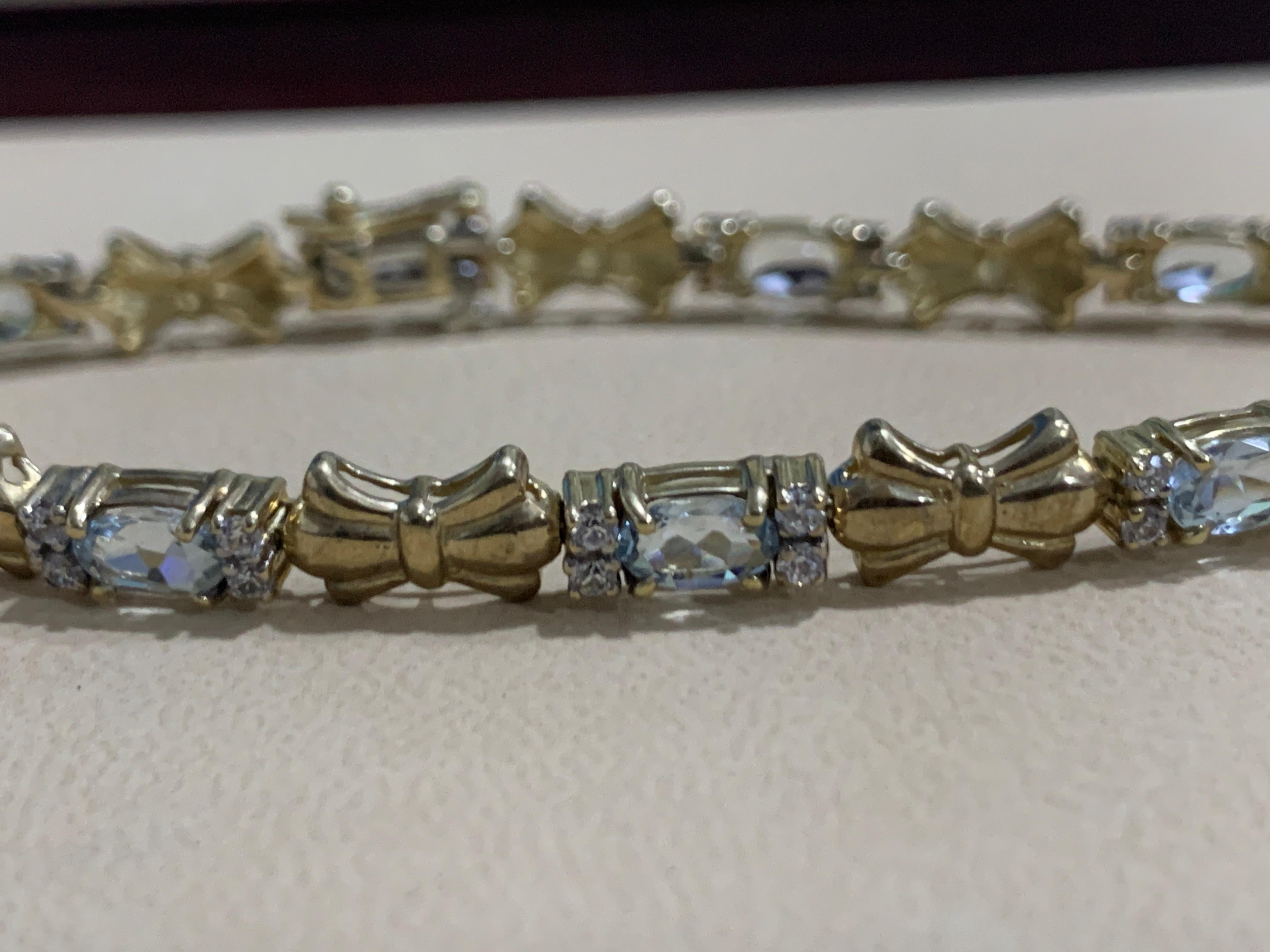 Oval Cut 4 Carat Natural Aquamarine and Diamond Tennis Bracelet 10 Karat Yellow Gold