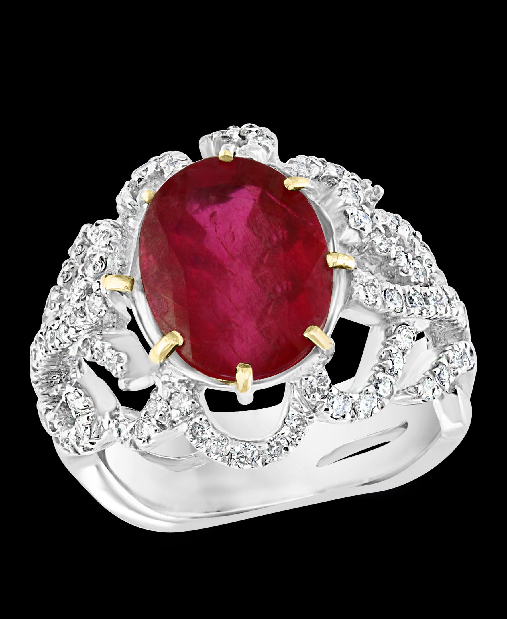 Approximately 4 Carat  Natural Ruby And Diamond 18 Karat White Gold Ring Size 5
 prong set
18 K White Gold: 10  gram
Stamped 750
Ring Size 5 ( can be altered for no charge )
Large 4 carat oval shape ruby Natural Stone surrounded by brilliant cut