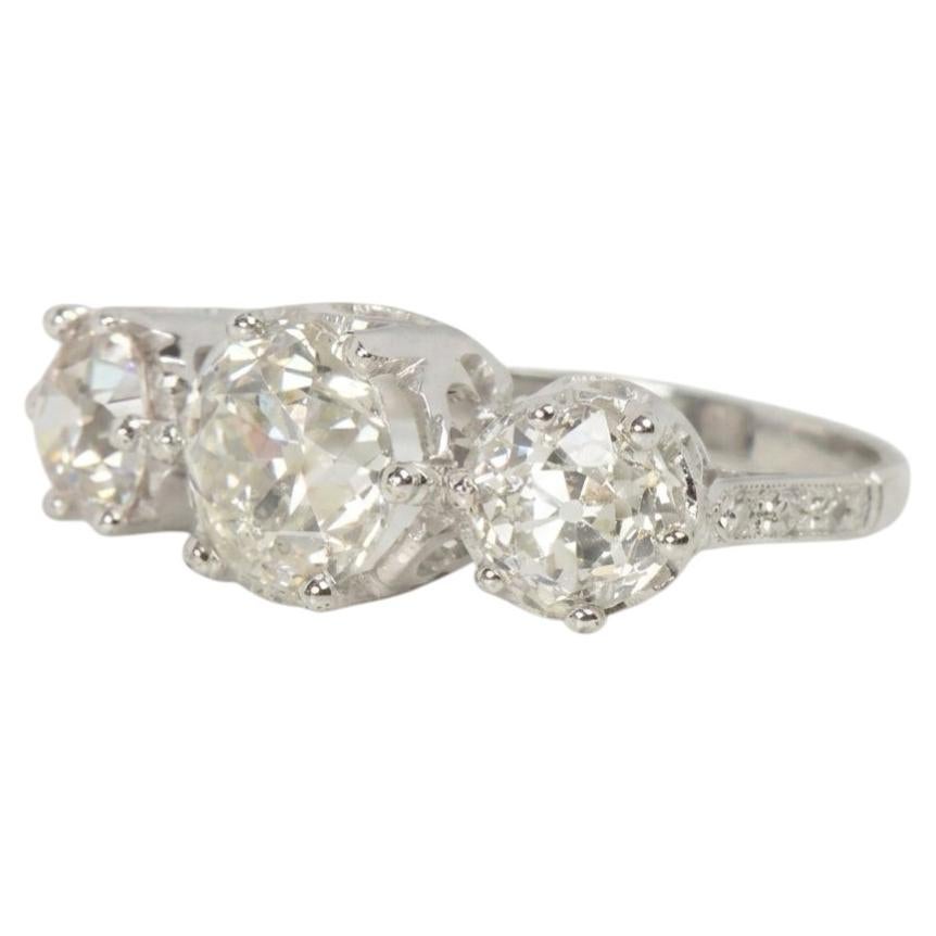 4 Carat Old European Cut Diamond Three-Stone Platinum Ring