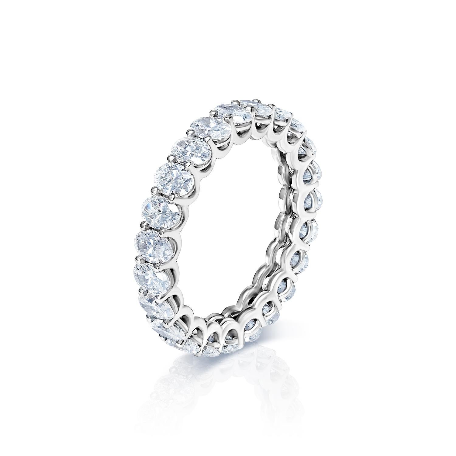 Earth Mined Diamonds:
Carat Weight: 4.48 Carats
Style: Oval Cut

Ring:
Total Carats: 4.48 Carats
Metal: 14 karat White Gold
Setting: U-shape shared prong
Size: Can be adjusted to any size