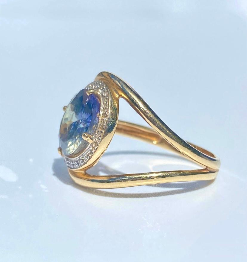 4 Carat Oval Cut Tanzanite with Split Shank Open Back 14k Gold Ring Setting In Excellent Condition In Miami, FL