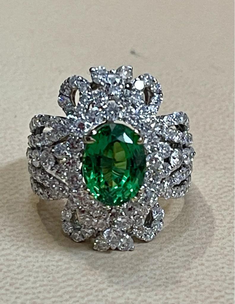 4 Carat Oval Tsavorite & 2.9 Carat Diamond in 18 Karat White Gold Ring Estate For Sale 9