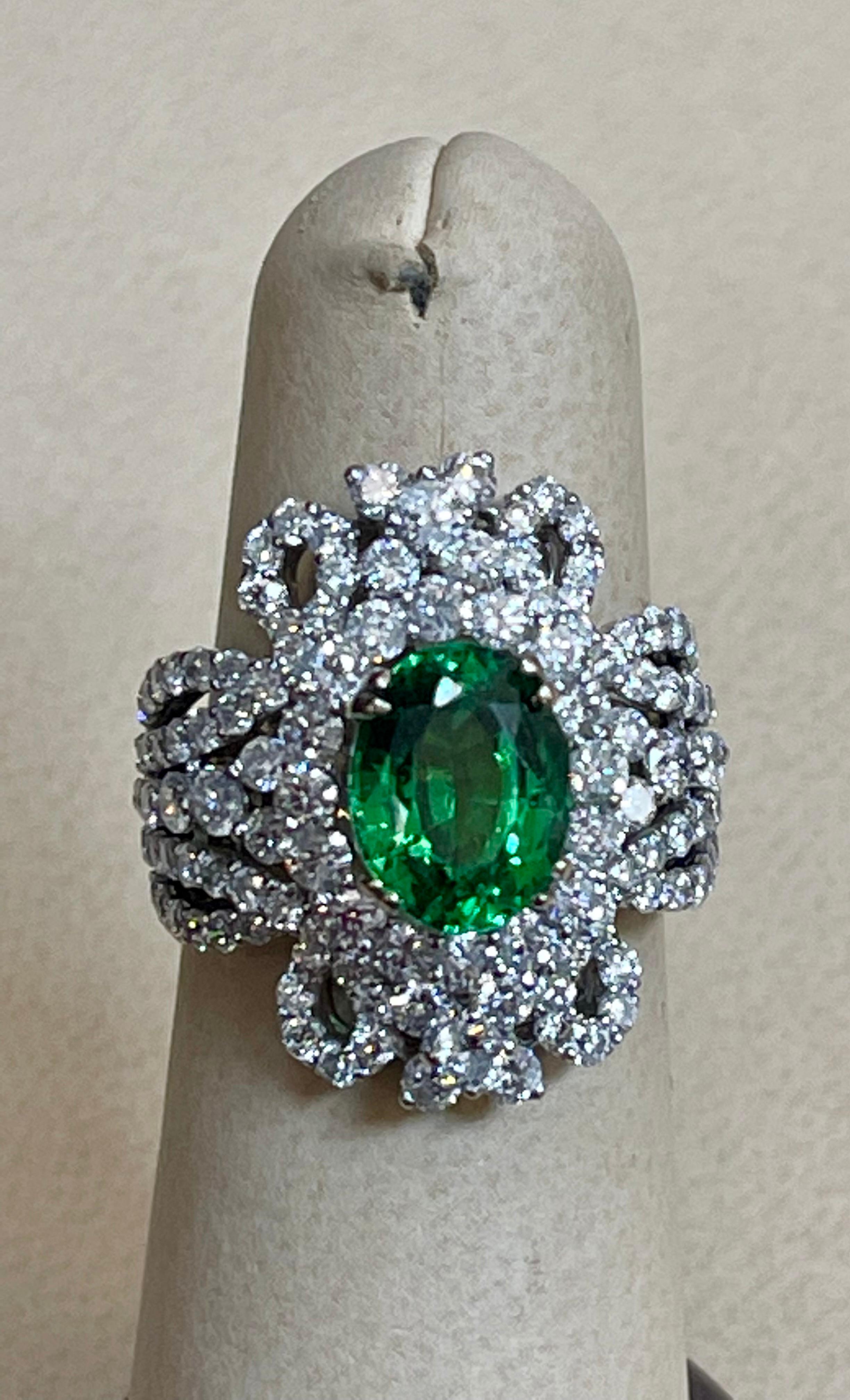 Oval Cut 4 Carat Oval Tsavorite & 2.9 Carat Diamond in 18 Karat White Gold Ring Estate For Sale