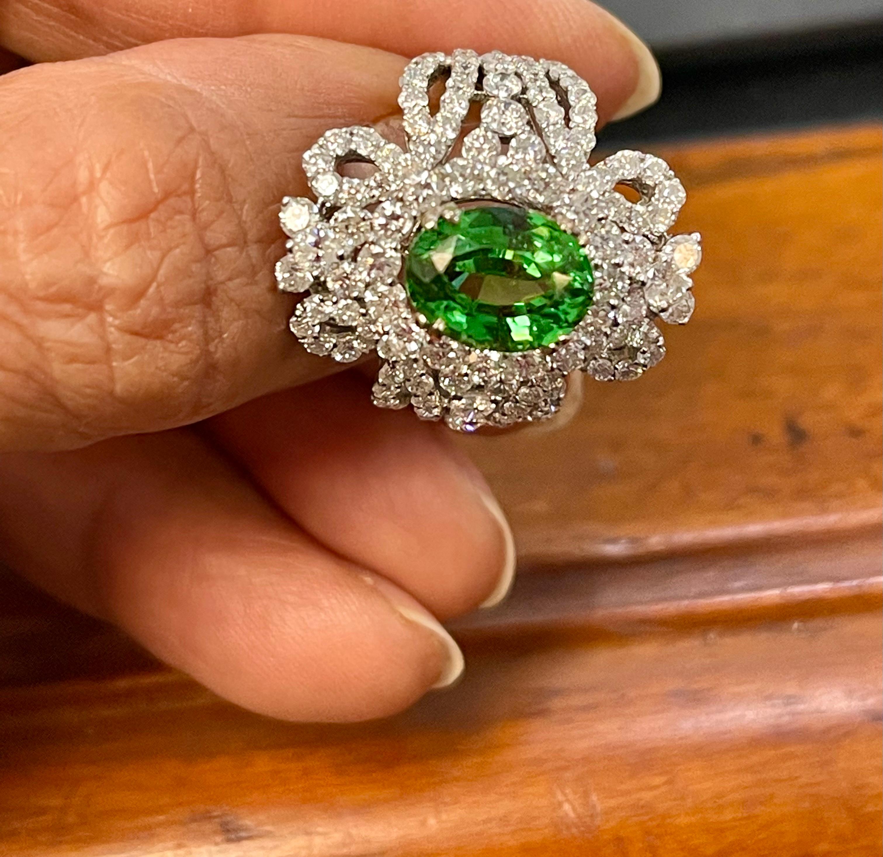 4 Carat Oval Tsavorite & 2.9 Carat Diamond in 18 Karat White Gold Ring Estate In Excellent Condition For Sale In New York, NY