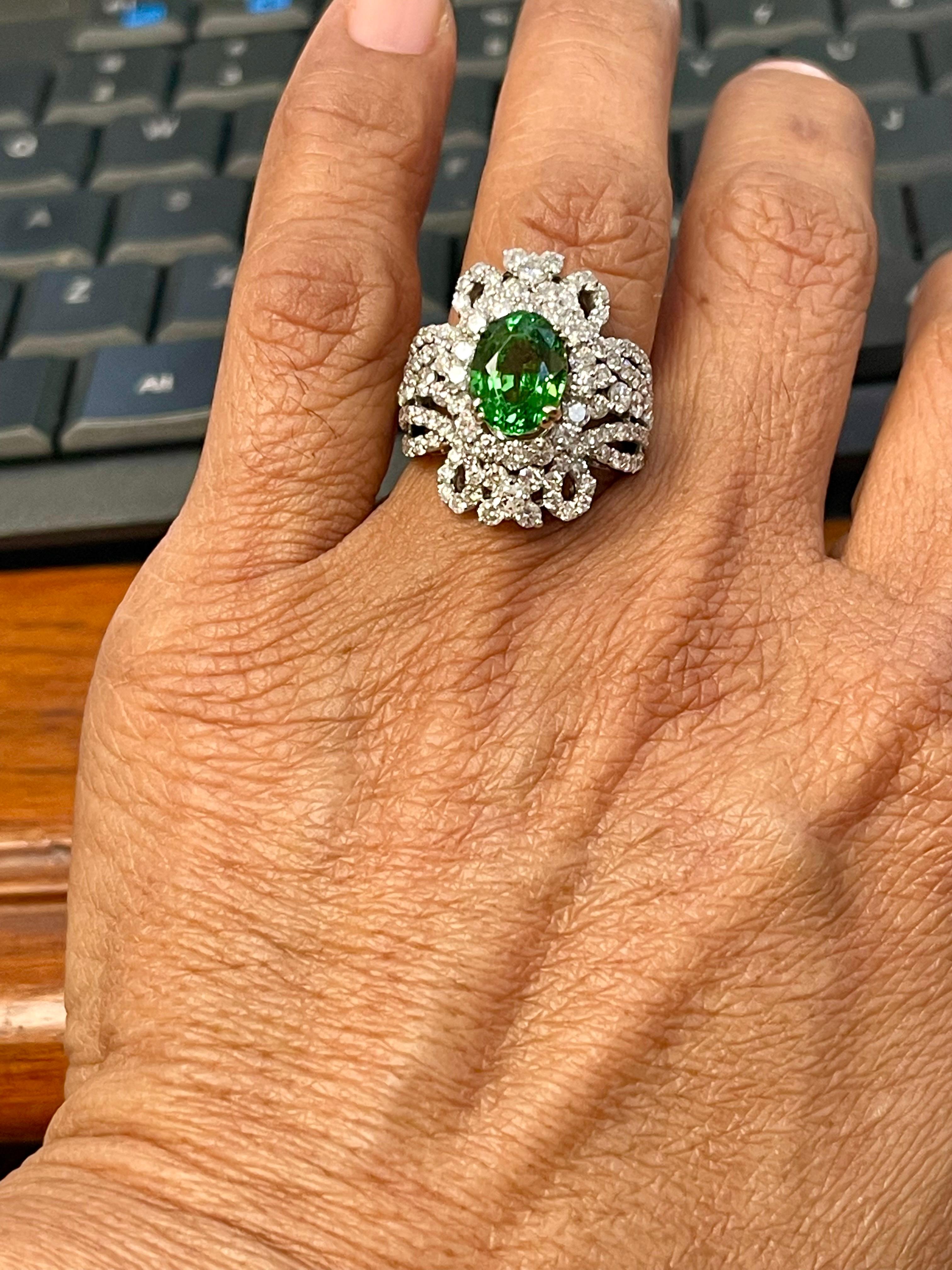 4 Carat Oval Tsavorite & 2.9 Carat Diamond in 18 Karat White Gold Ring Estate For Sale 1