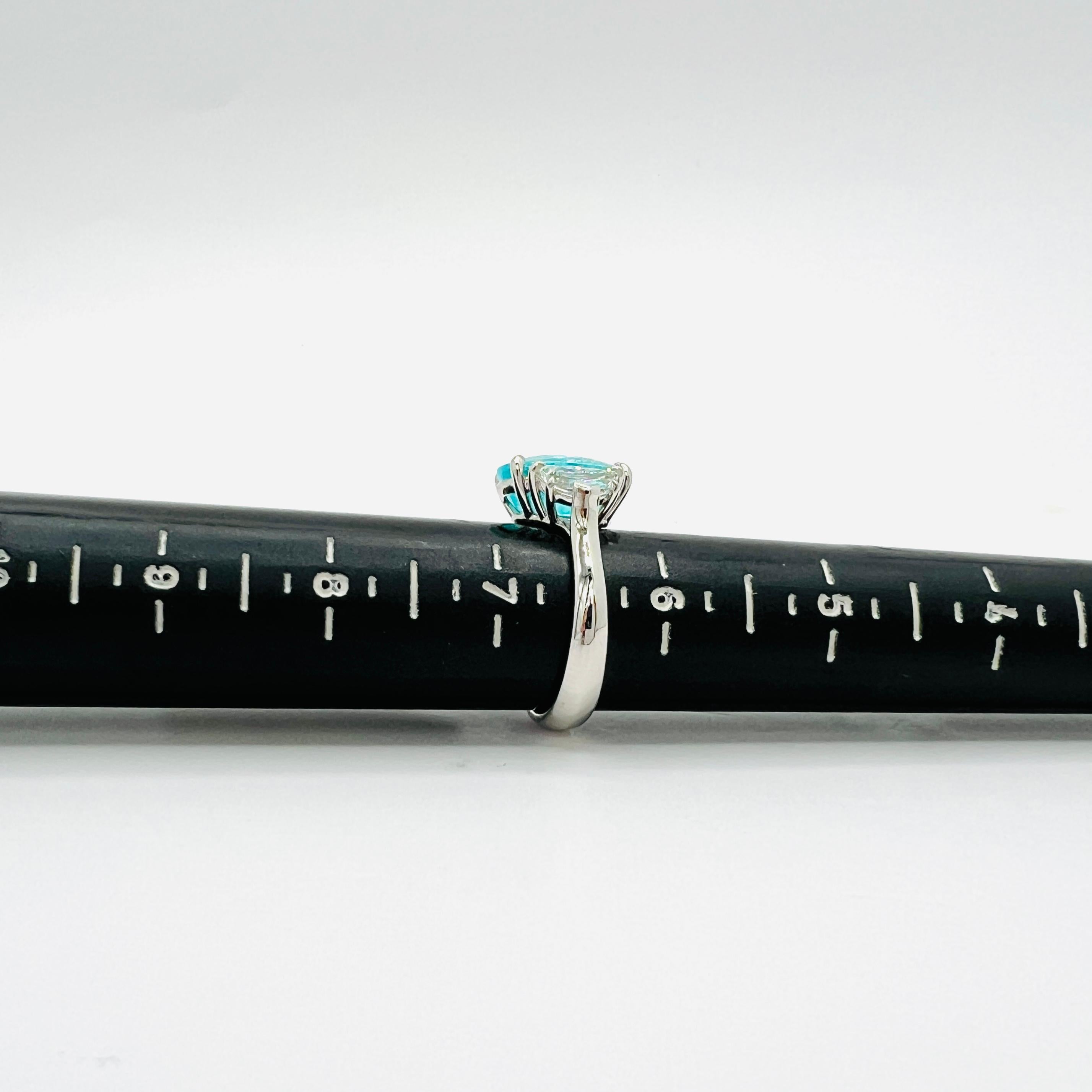 4 Carat Paraiba Tourmaline Oval and Cadillac Diamond 3 Stone Ring in Platinum en vente 4