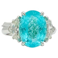 4 Carat Paraiba Tourmaline Oval and Cadillac Diamond 3 Stone Ring in Platinum