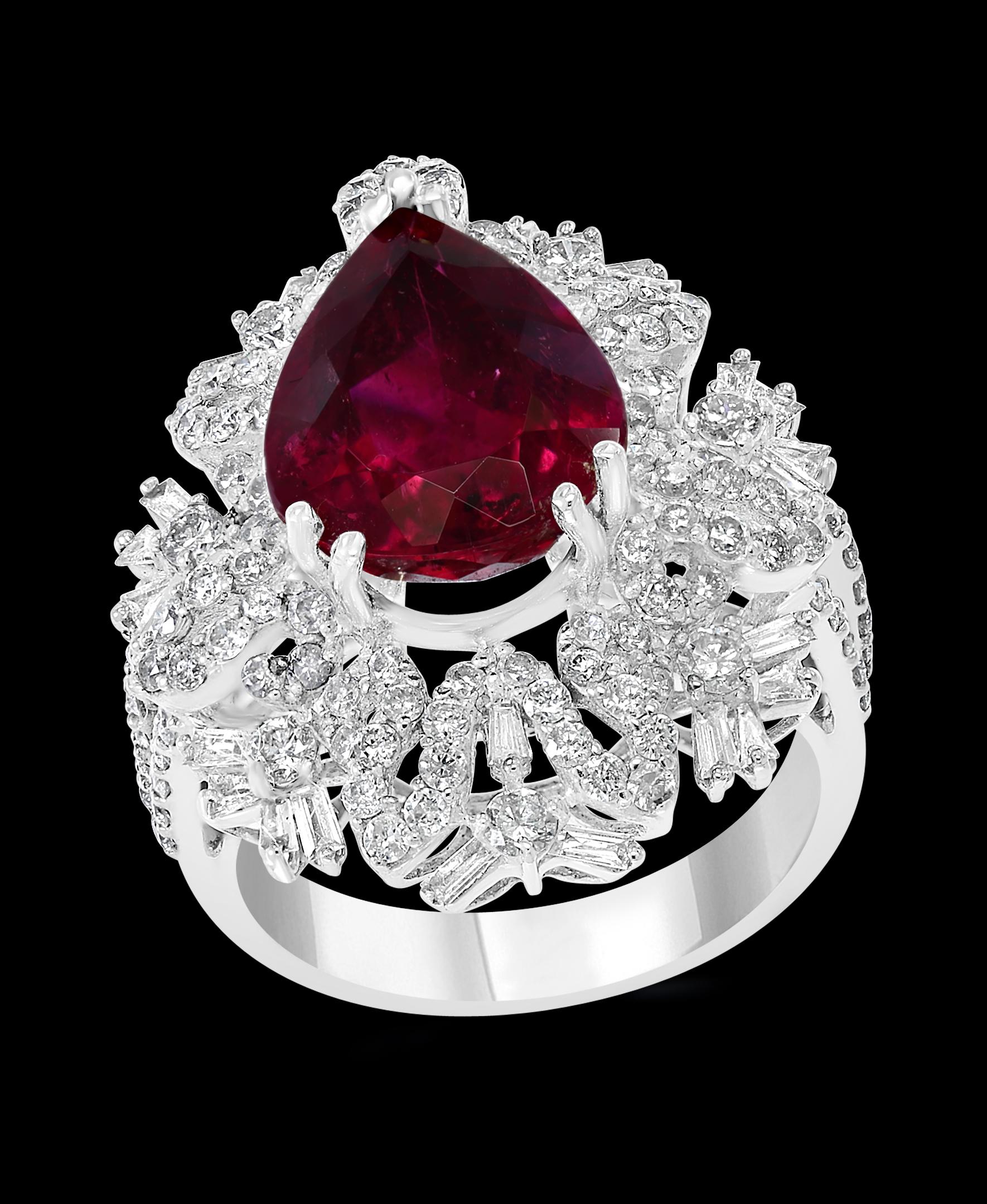 A classic, Cocktail ring 
4 Carat of very clean Rubellite in Pear shape and Diamond Ring
Gold: 18 carat White gold 
Weight: 9 gram
Ring Size 7
Diamonds: approximate 2.5 Carat 
 Very good value ! 

Please look at the all the pictures to get a better