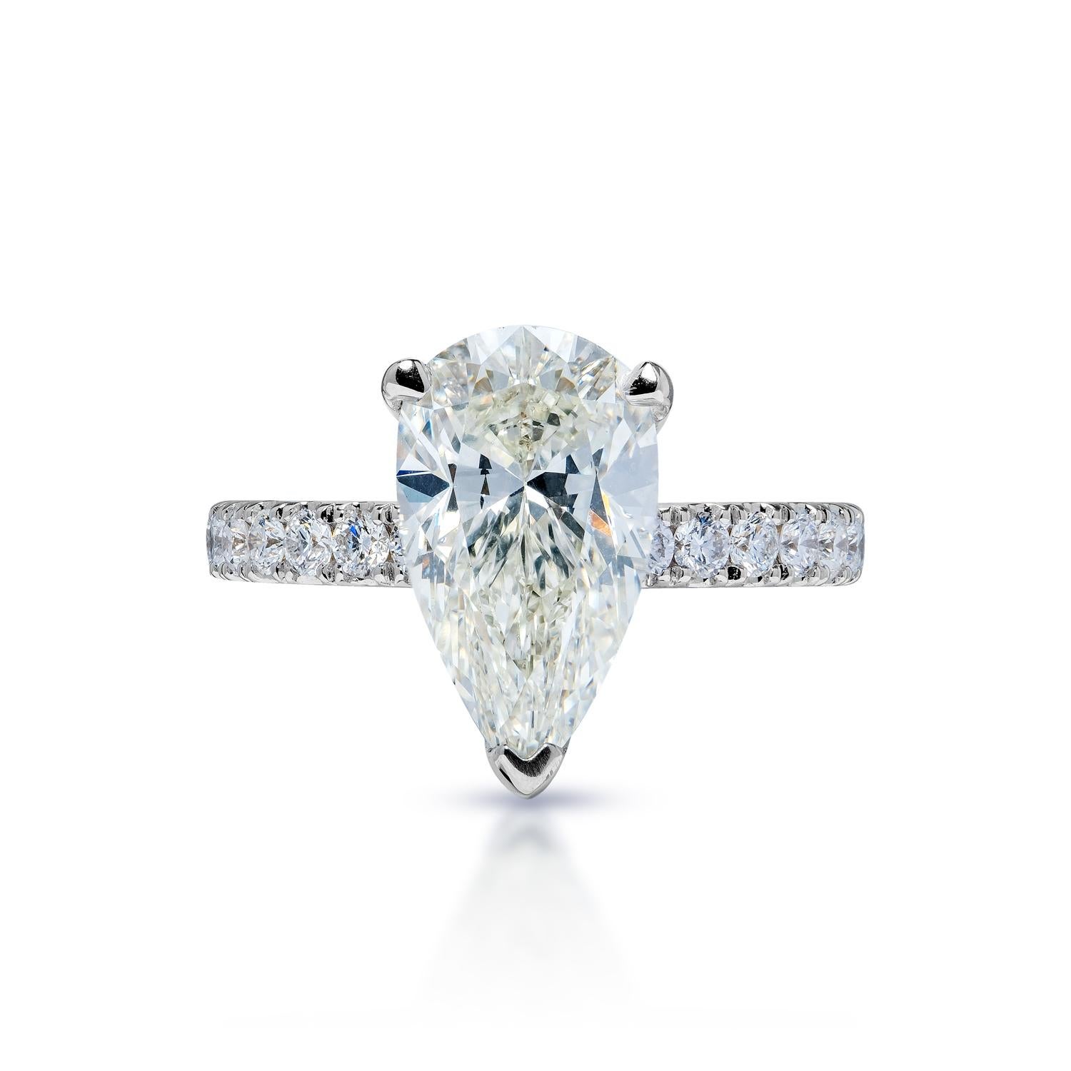 EGL Certified


Center Earth Mined Diamond:
Carat Weight: 3.11 Carats
Color: G
Clarity: VS1
Style: Pear Shape

Ring:
Carat Weight: 0.68 Carats
Style: Round Brilliant Cut
Metal: 18 Karat White Gold
Setting: Sidestone
Size: Can be adjusted to any
