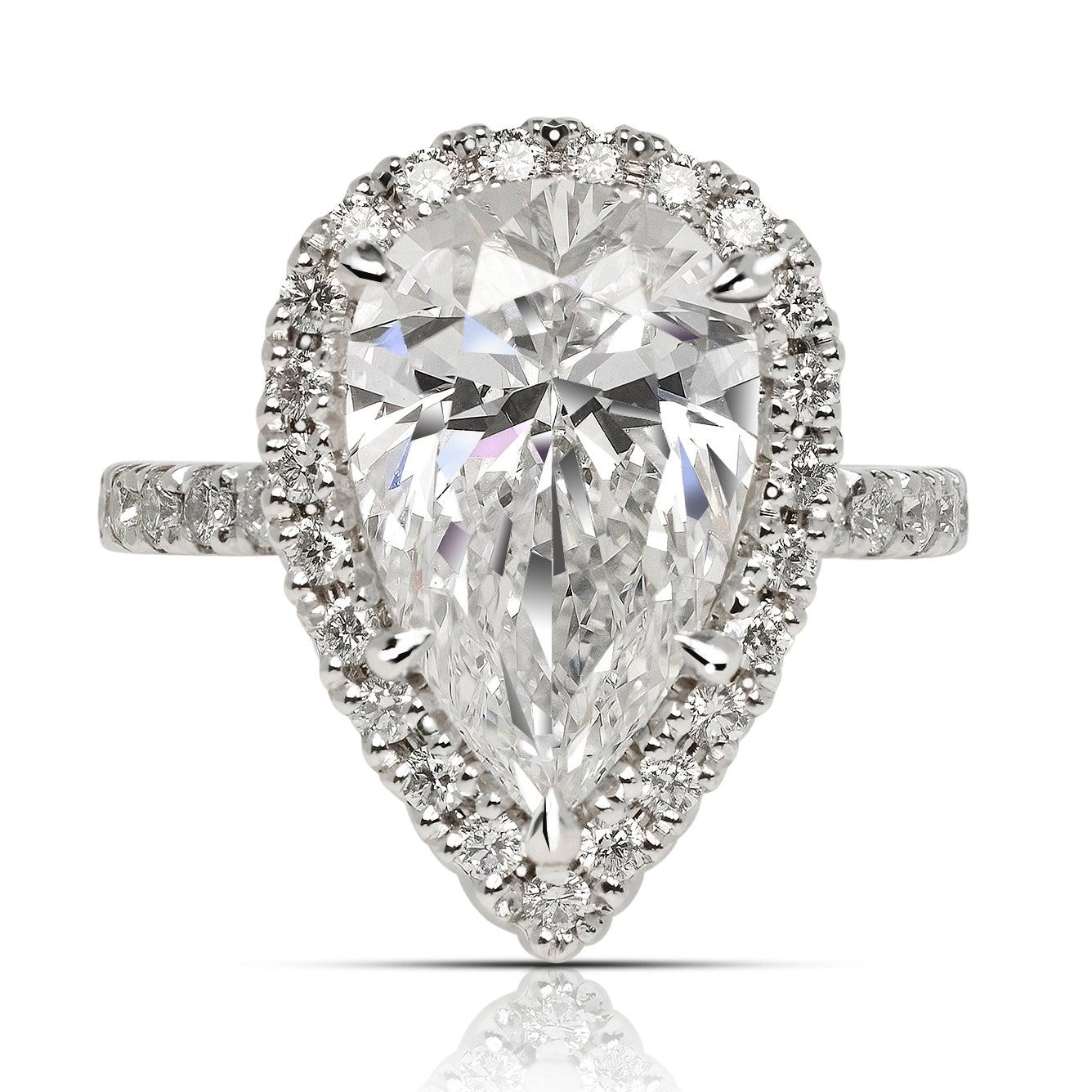 BELLA PEAR SHAPED DIAMOND ENGAGEMENT RING BY MIKE NEKTA

GIA CERTIFIED

Center Diamond:
Carat Weight: 3 Carats
Color: D*
Clarity: VVS1
Style: PEAR BRILLIANT
Approximate Measurements: 12.9 x 8.2 x 5.1 mm
* This diamond has been treated by one or more