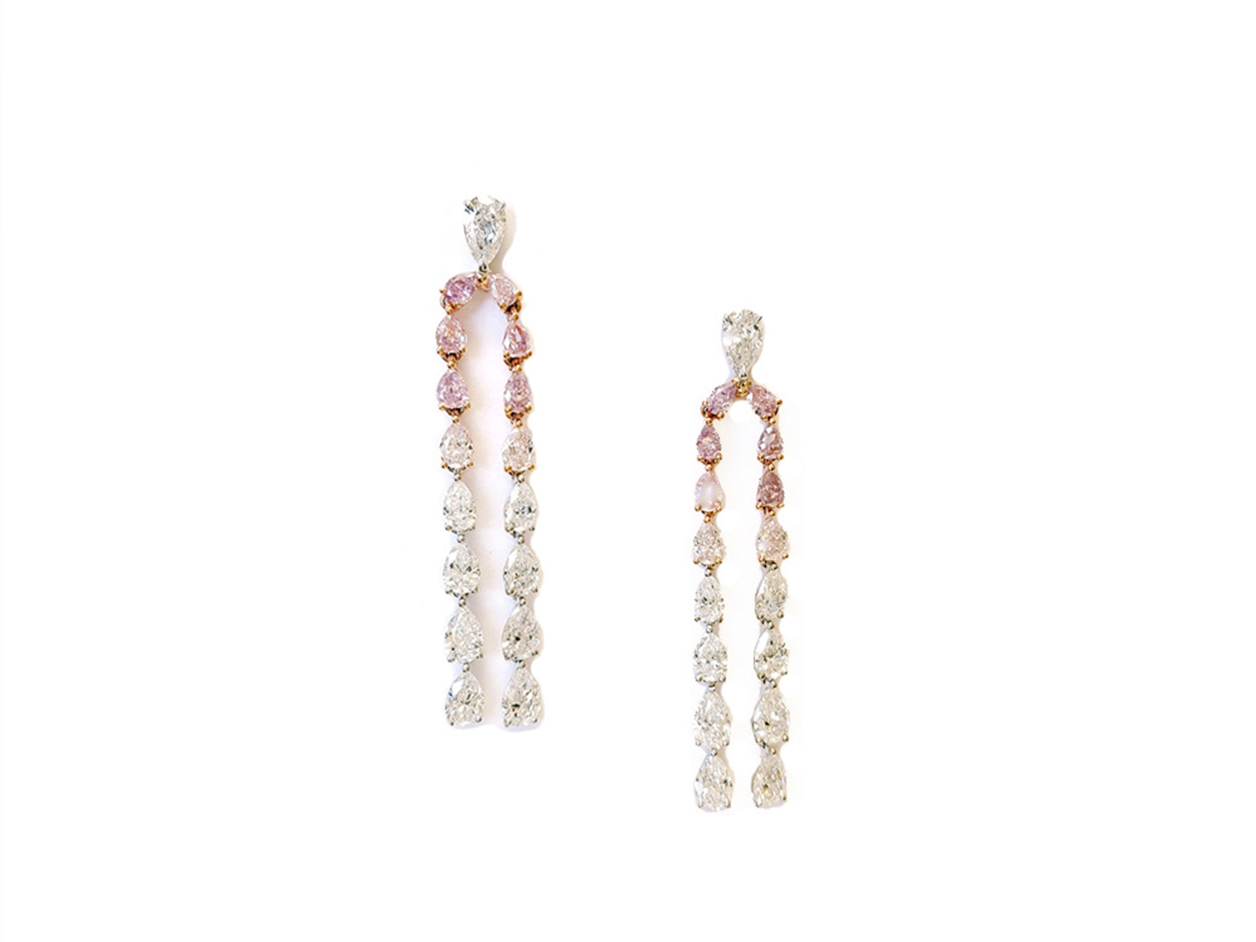 A stunning matched pair of 4.02 carat pear-shaped Pink and White Diamond 18k Rose Gold Tassel Drop Earrings.
These elegant and unique tassel drop earrings showcase 1.75 carat pear-shaped pink diamonds and 2.27 pear-shaped white diamonds VS