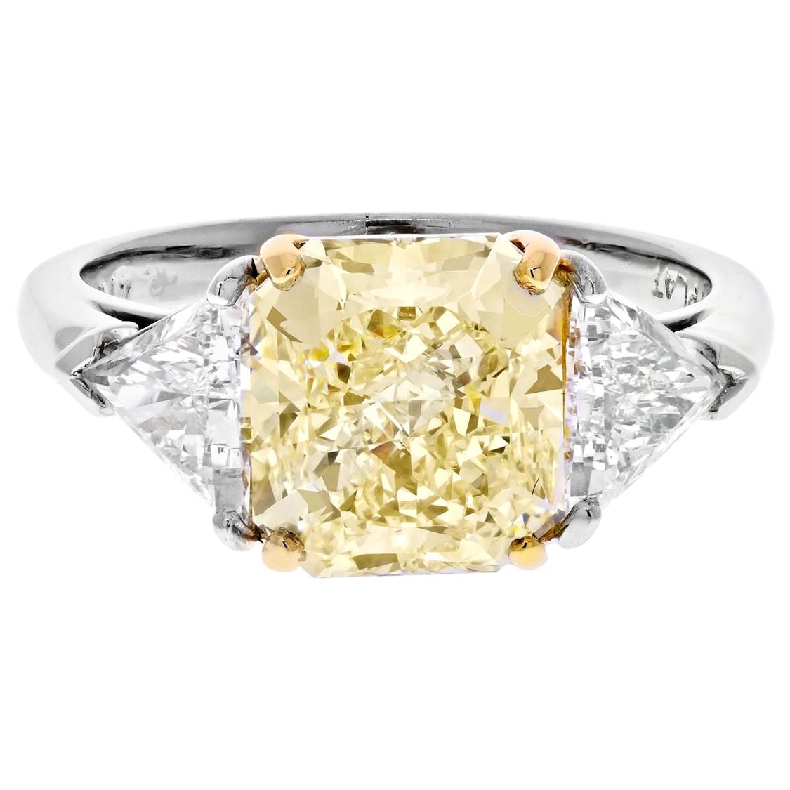 4 Carat Radiant Cut Diamond Fancy Yellow GIA Three-Stone Engagement Ring