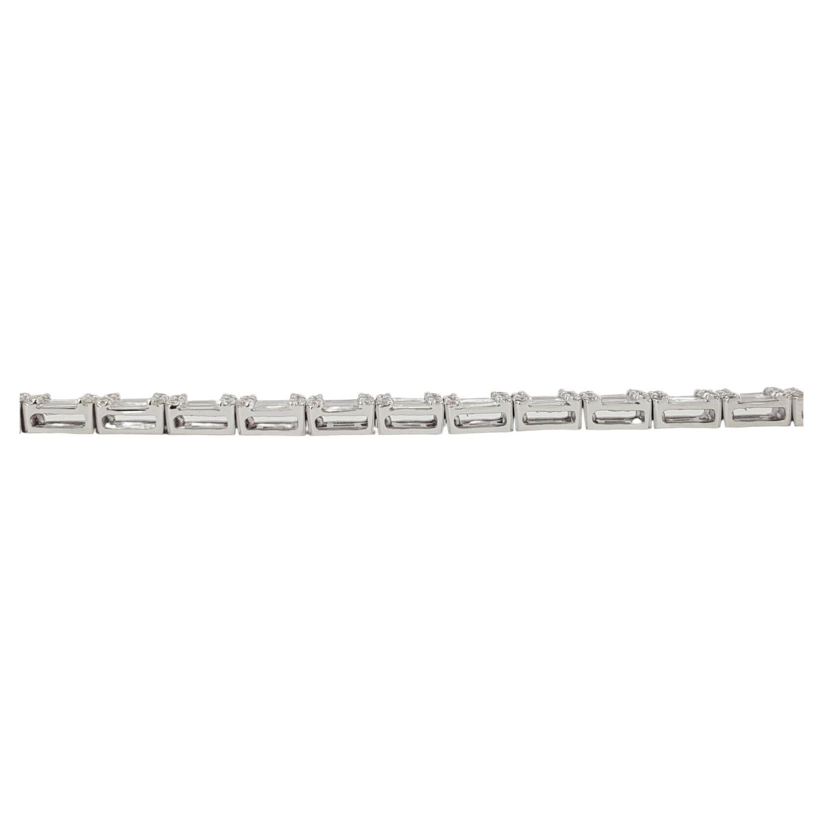 4.1 ct Total Weight Round Brilliant & Baguette Cut Diamond Three-Rows 18k White Gold Tennis Bracelet. 

The bracelet weighs 12.9 grams, 7 inches long, there are 180 Natural Round Brilliant Cut Diamonds & 90 Natural Baguette Diamonds weighing 4.1 ct,