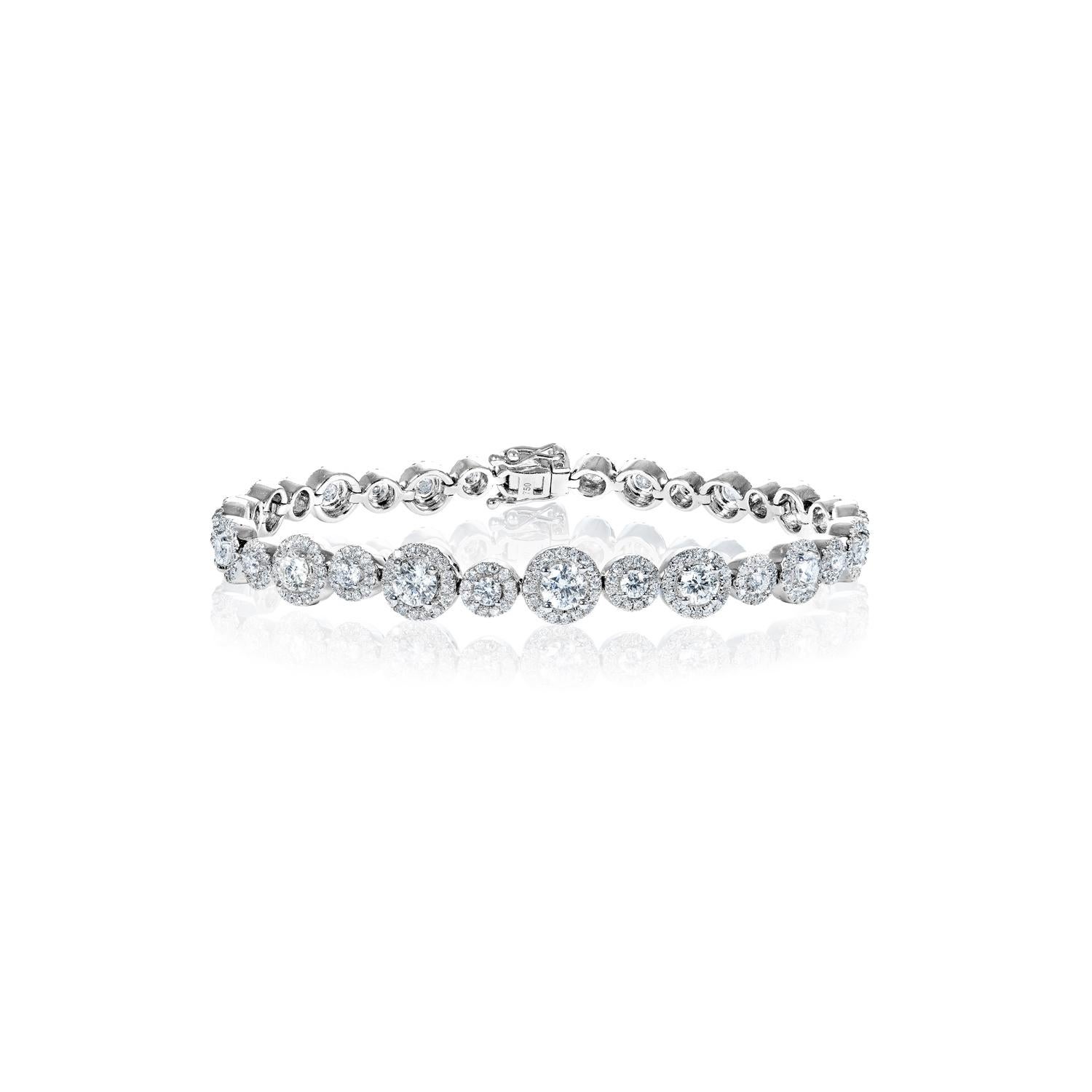 Feather Filled- Spl Care Req'd

Style: Diamond Single Row Bracelet
Diamonds:
Diamond Size: 4.16 Carats
Diamond Shape: Round Brilliant Cut

Setting
Metal: 18K White Gold
Clasp: Box catch with hidden safety

Total Carat Weight: 4.16 Carats