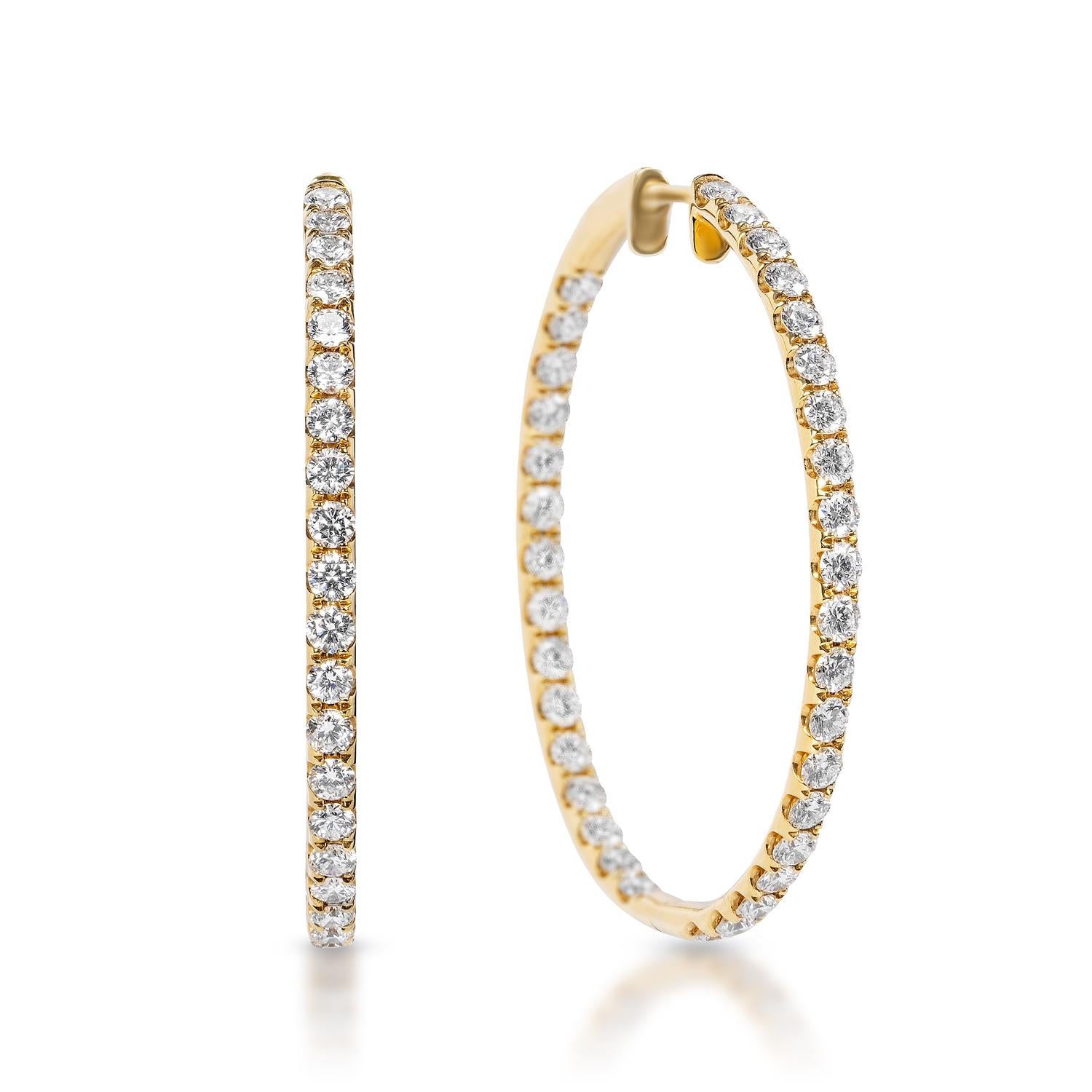 Diamond Hoop Earrings:

Carat Weight: 3.70 Carats
Shape: Round Brilliant Cut
Metal: 14 Karat Yellow Gold
Style: Hoop Earrings