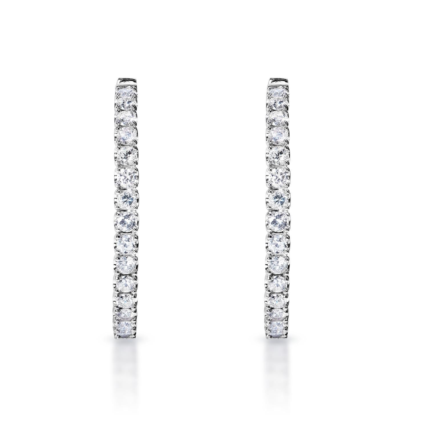 Diamond Hoop Earrings:

Carat Weight: 4.10 Carats
Shape: Round Brilliant Cut
Metal: 14 Karat White Gold
Style: Hoop Earrings

 

Also Available in Yellow Gold