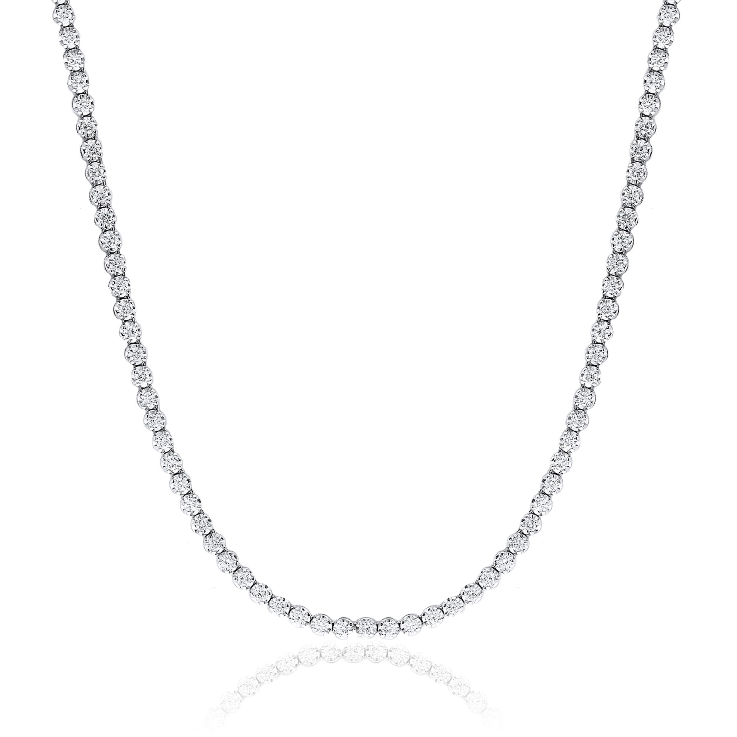 A classic and timeless tennis necklace showcasing 137 round brilliant diamonds set all over in a bezel made in 14k white gold. Diamonds weigh 4 carats total.
Style available in different price ranges. Prices are based on your selection. Please