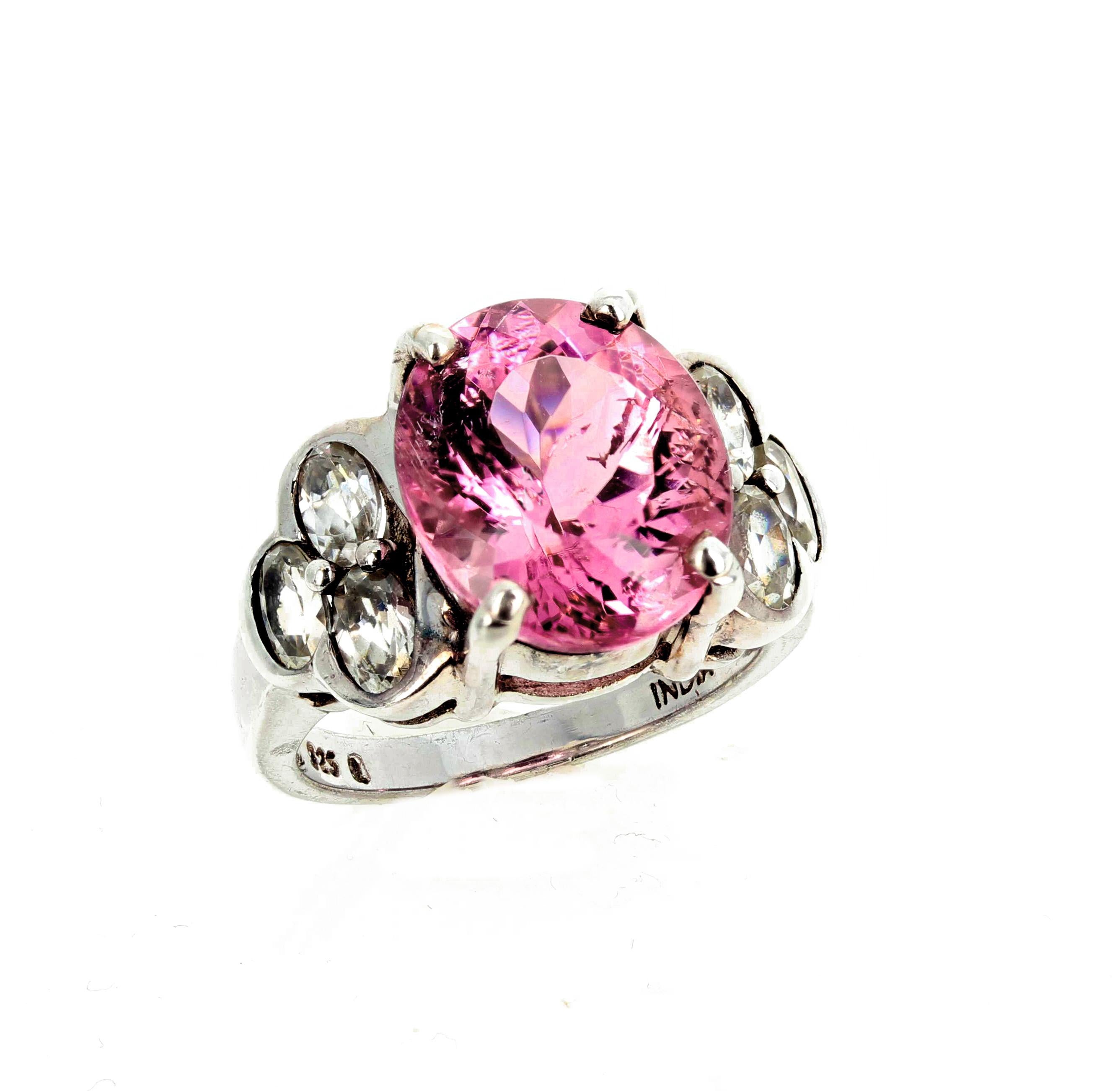 Unique 4 carat glittering pink tourmaline (12.5 mm x 6.5 mm) enhanced with sparkling silver quartz gemstones set in a lovely Sterling Silver ring size 7 (sizable for free). Spectacular optical effect in the Tourmaline exhibits brilliant reflections