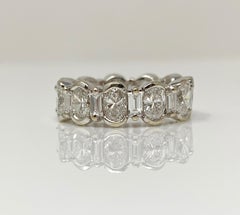 4 Carat Total Weight Oval Brilliant and Baguette Diamond Wedding Band