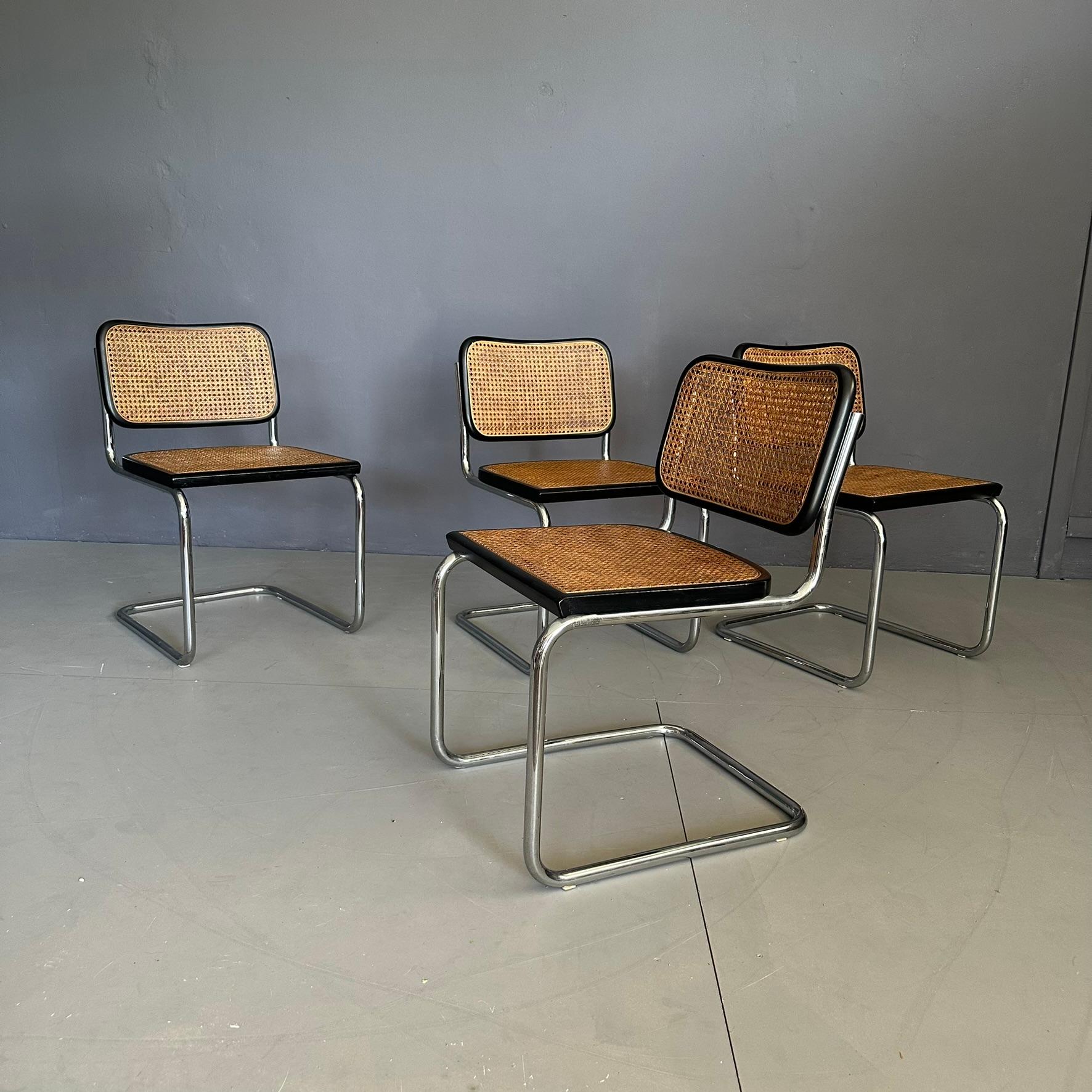 Set of 4 CESCA chairs, model B32, design by Marcel Breuer for Gavina, Italian manufacture from the seventies.

Chromed tubular steel structure, seat and backrest in straw with profiles in black stained beech.
On the back of the seat you can see the