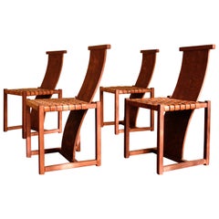 4 chaises en cuir et bois teinté, design italien du milieu du siècle dernier, années 70