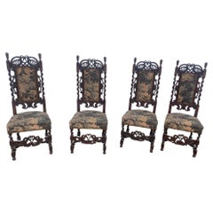 Antique 4 chairs with high backrest in oak and upholstery in the English Renaissance 