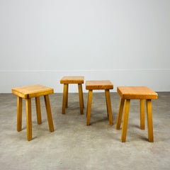 4 Charlotte Perriand pine stools, Les Arcs, 1960's