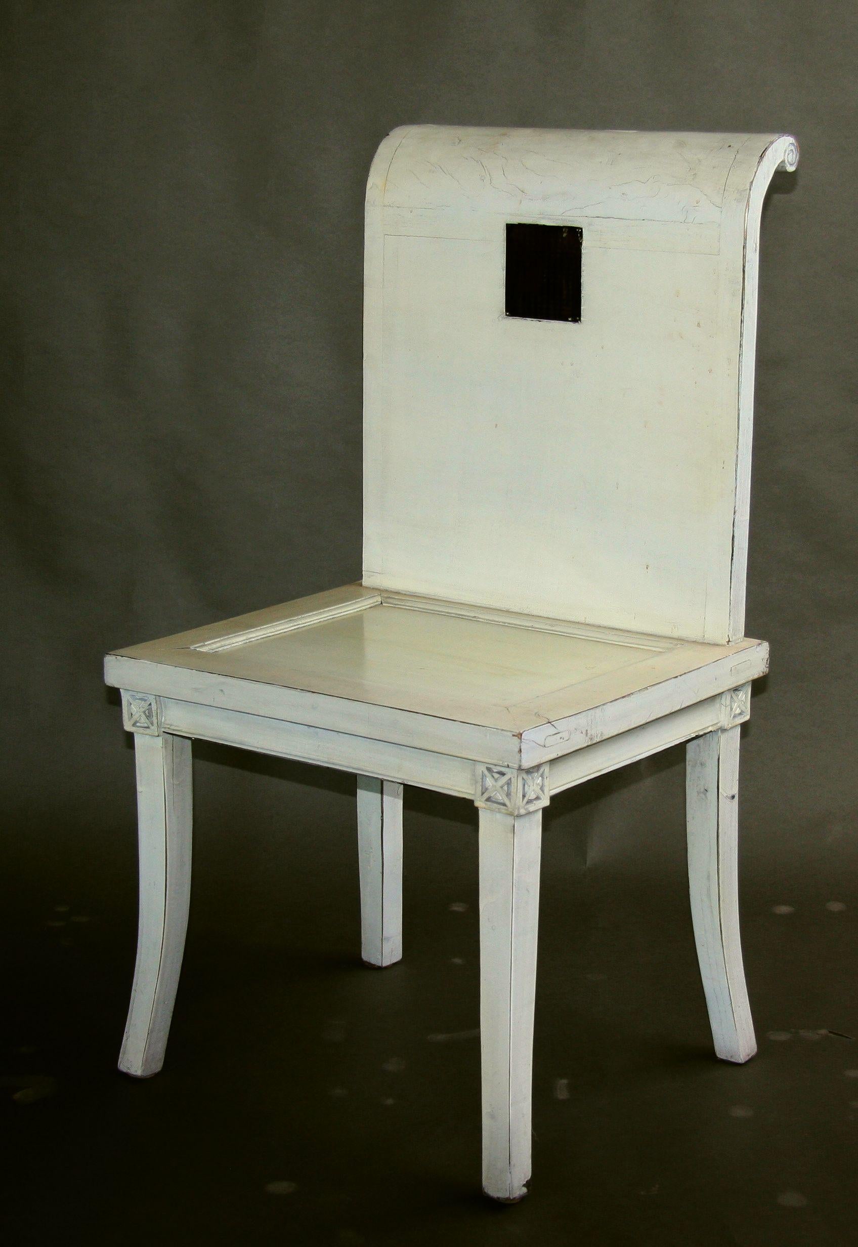 Set of four Chinese white laquered chairs with an inscribed brass inlay, China, 1920.